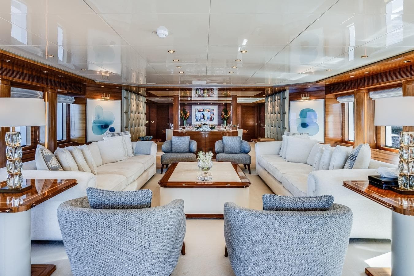 Luxurious interior of 2006 Mondomarine motor yacht with elegant seating and modern decor.
