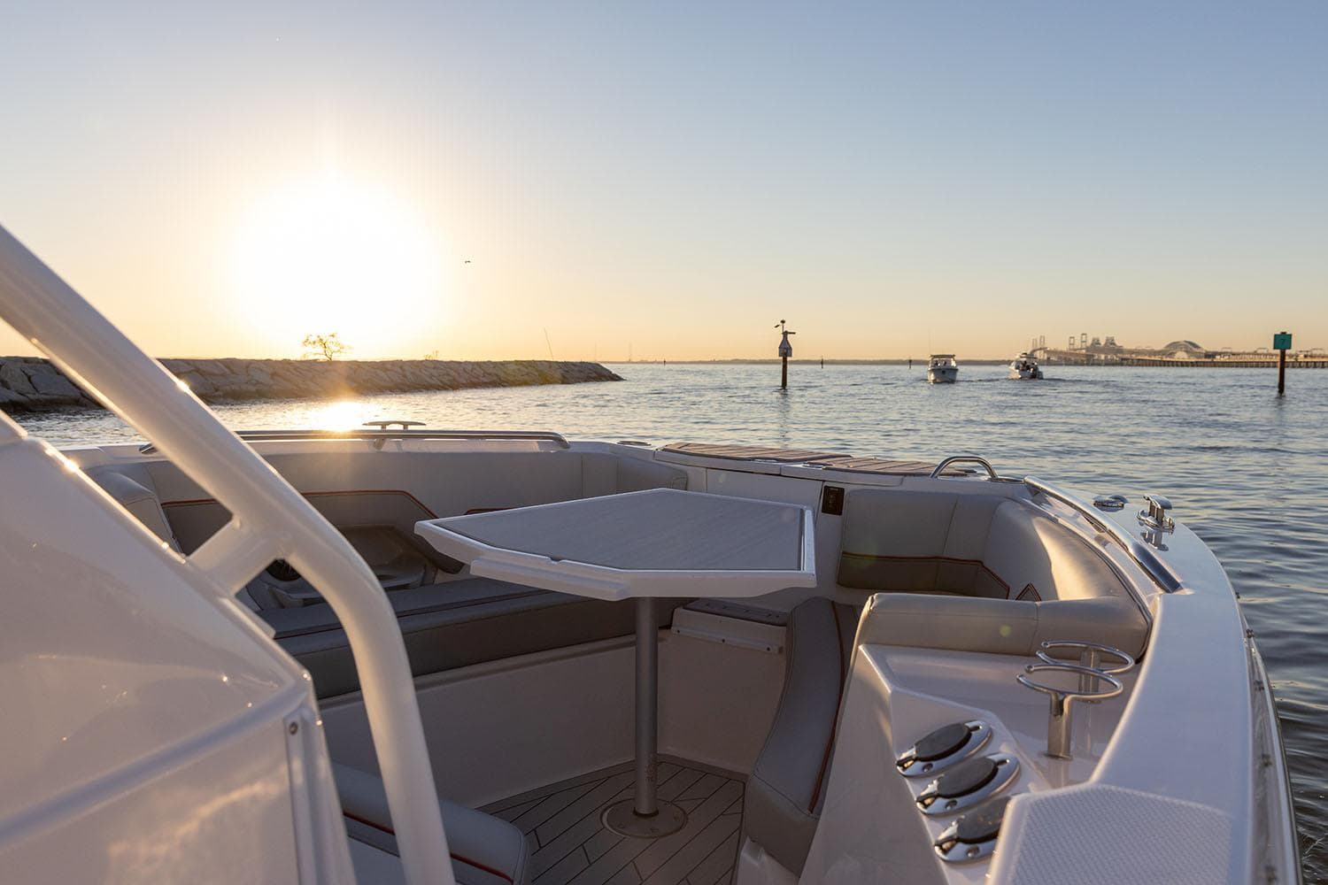 Manufacturer Provided Image: Solara S-250 CW boat at sunset on calm waters, 2025 model.