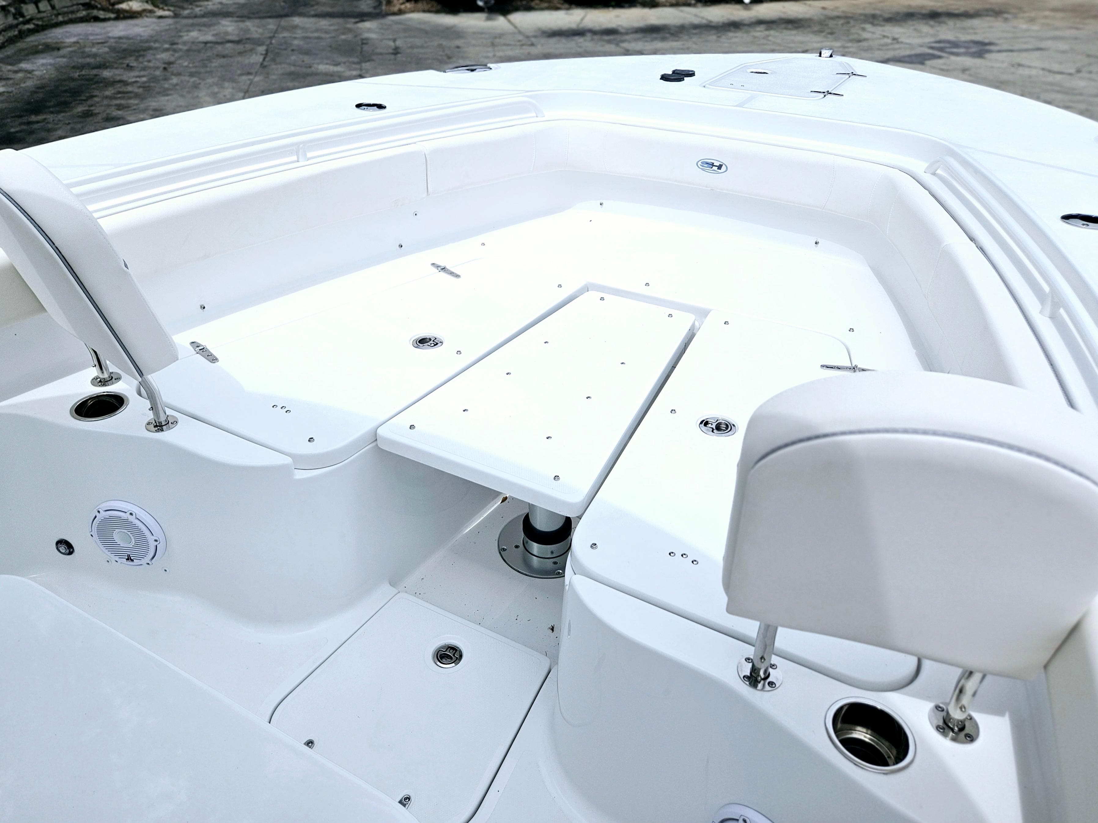 2025 Sea Hunt Gamefish 28 FS boat interior with seating and storage compartments.