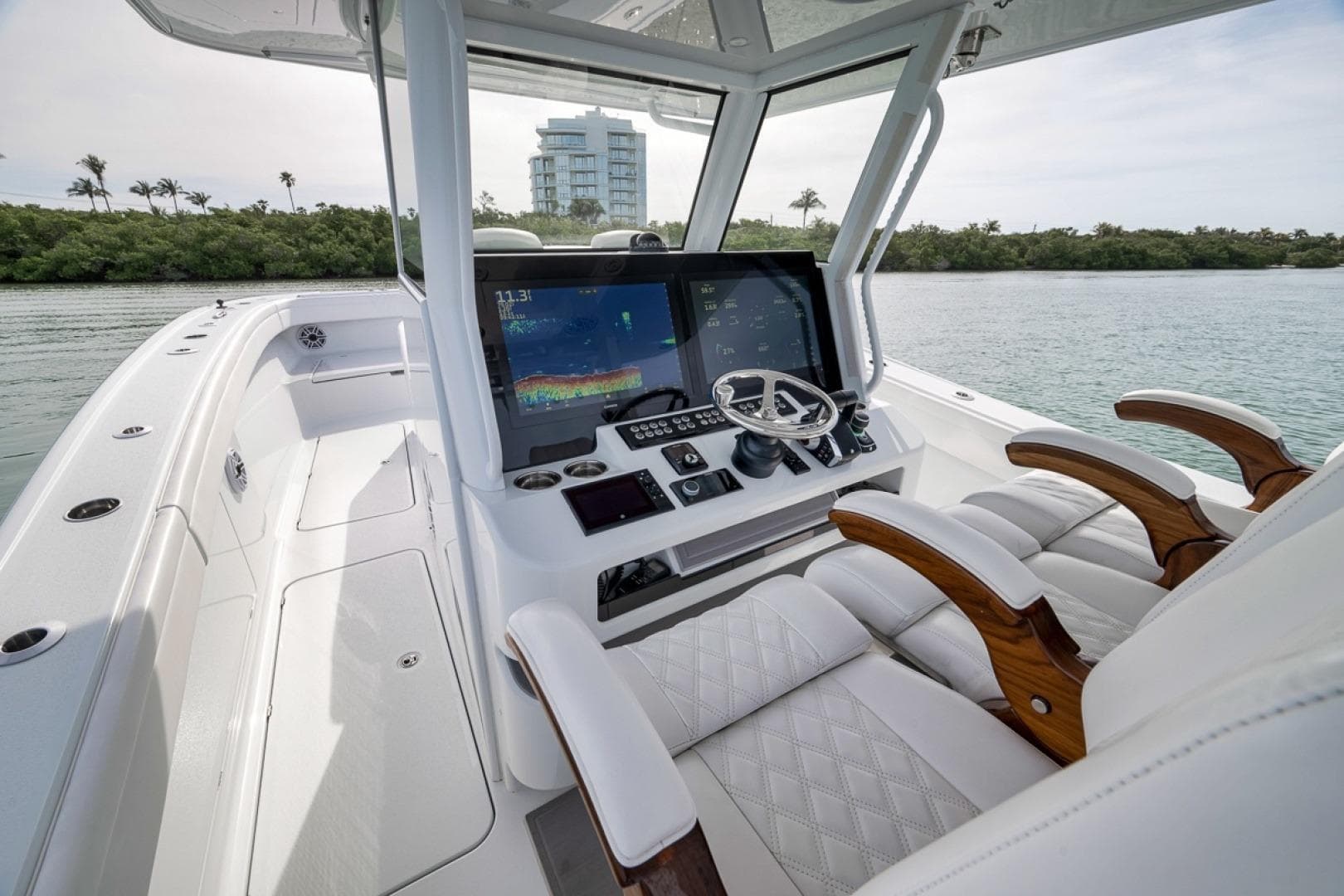 2024 Costa Custom Boats 34SV helm with advanced navigation system and luxurious seating.