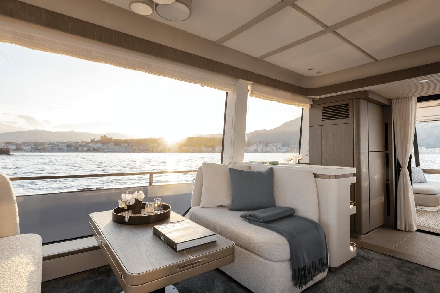 Luxurious interior of 2025 Azimut Magellano 60 yacht with scenic ocean view.