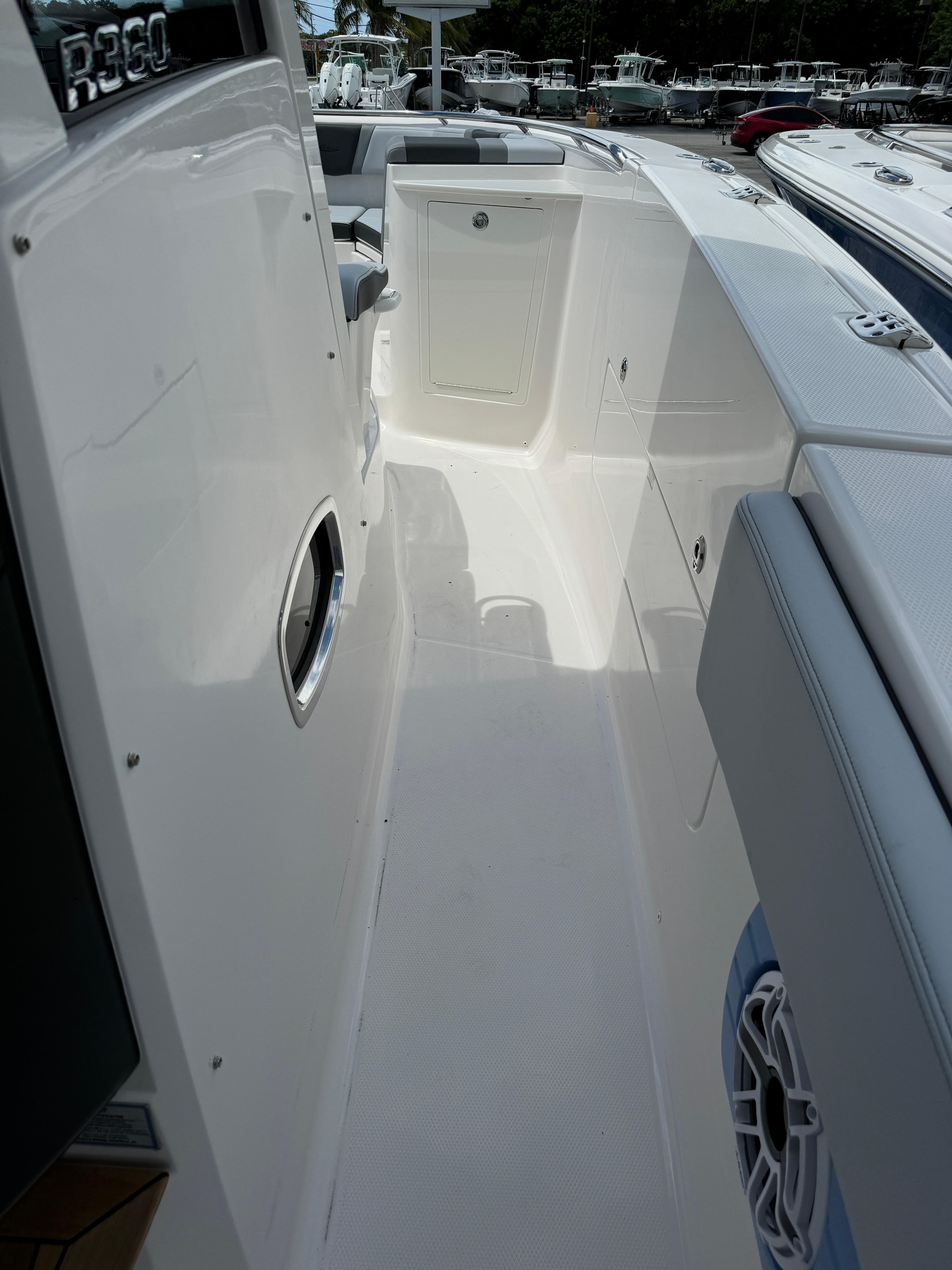 2025 Robalo R360 Center Console boat interior, featuring sleek white design and modern amenities.
