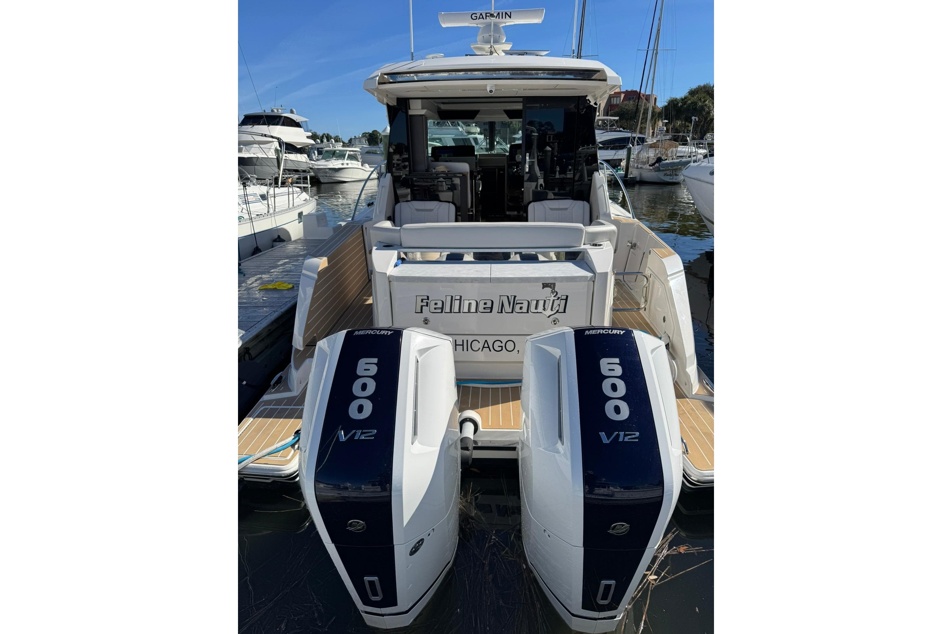 2025 Tiara Yachts 43 LE with dual Mercury 600 V12 engines docked in marina.
