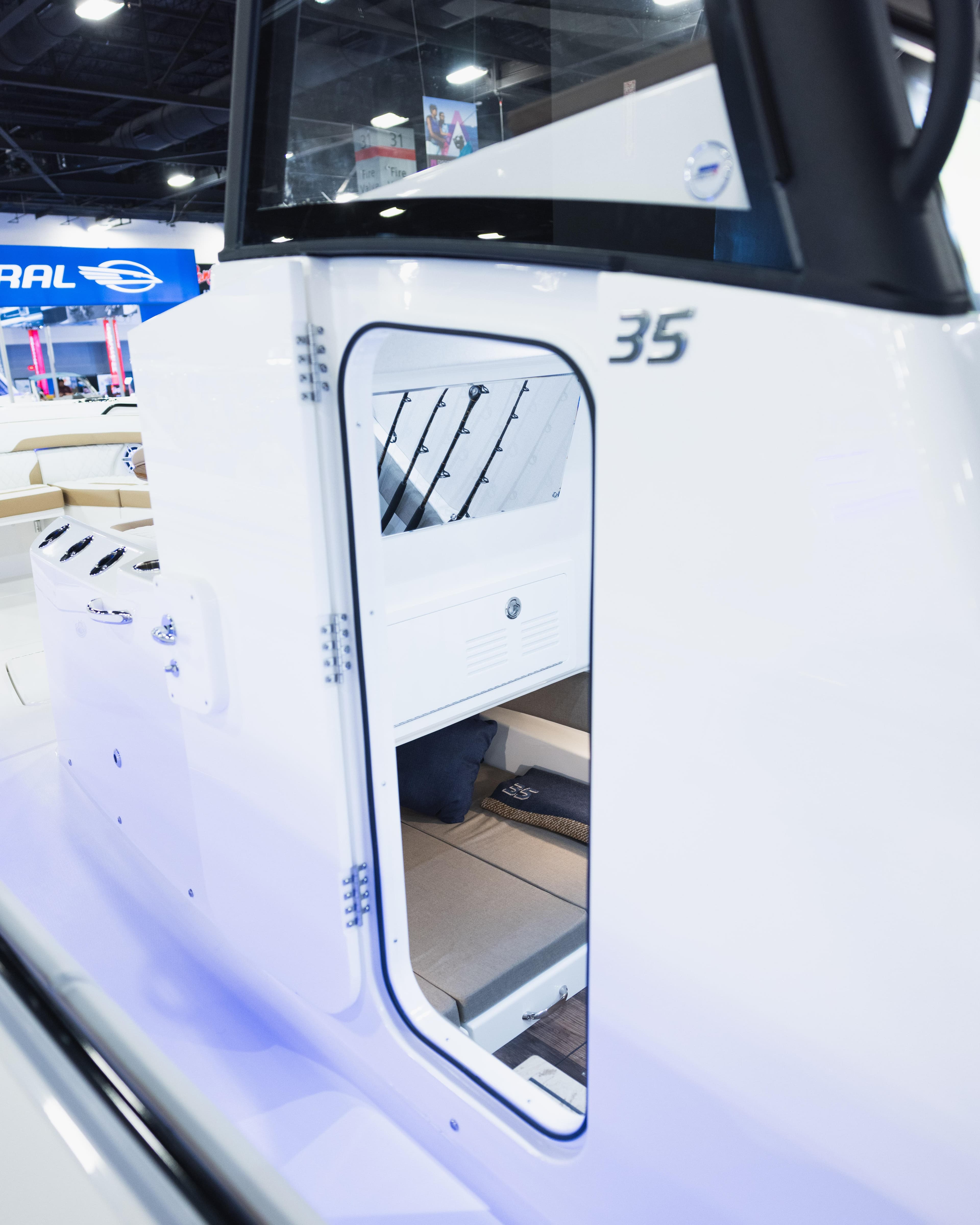 2026 Regulator 35 boat interior, showcasing sleek design and modern features at a boat show.