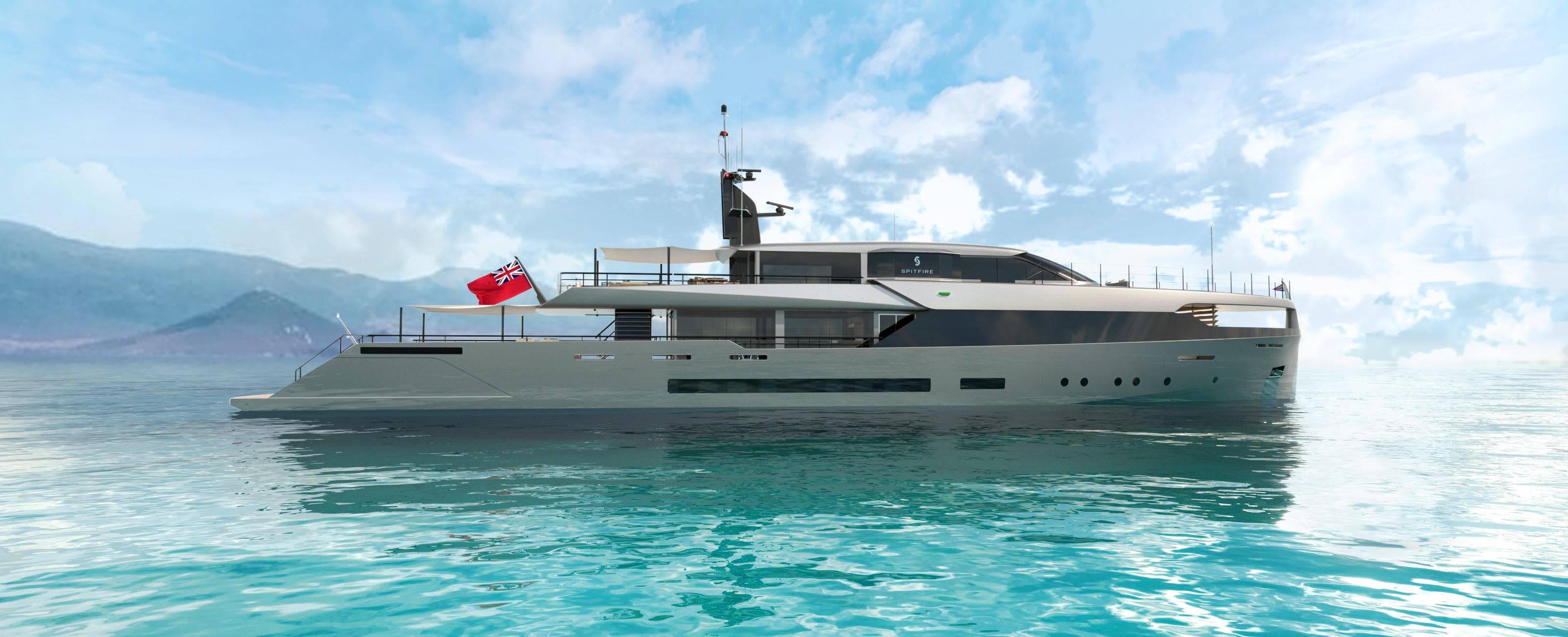 Custom ARES SPITFIRE 2027 yacht on serene ocean with mountainous backdrop.