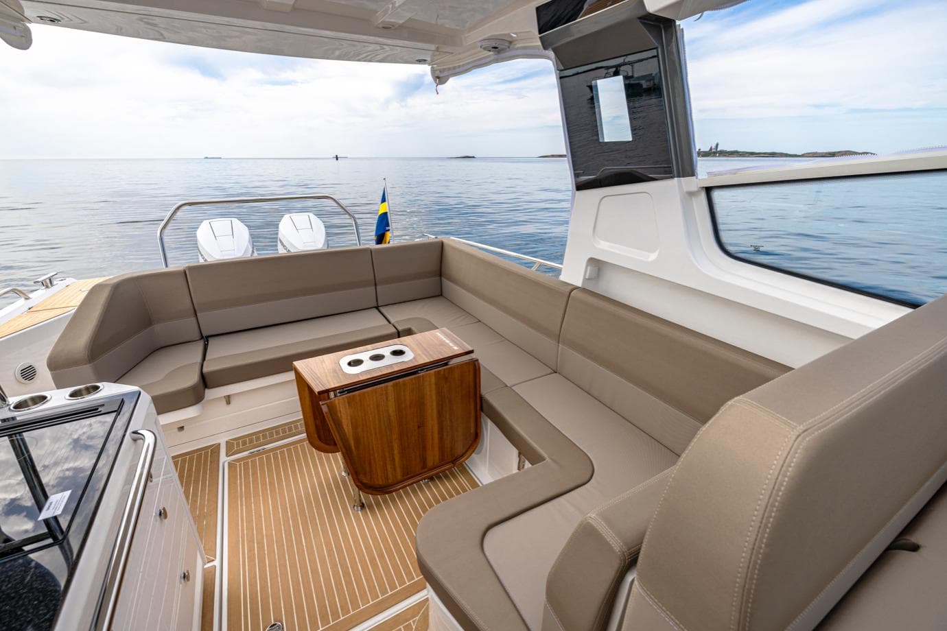 Manufacturer Provided Image: Interior of Nimbus Weekender 11 yacht, 2026 model, featuring stylish seating.