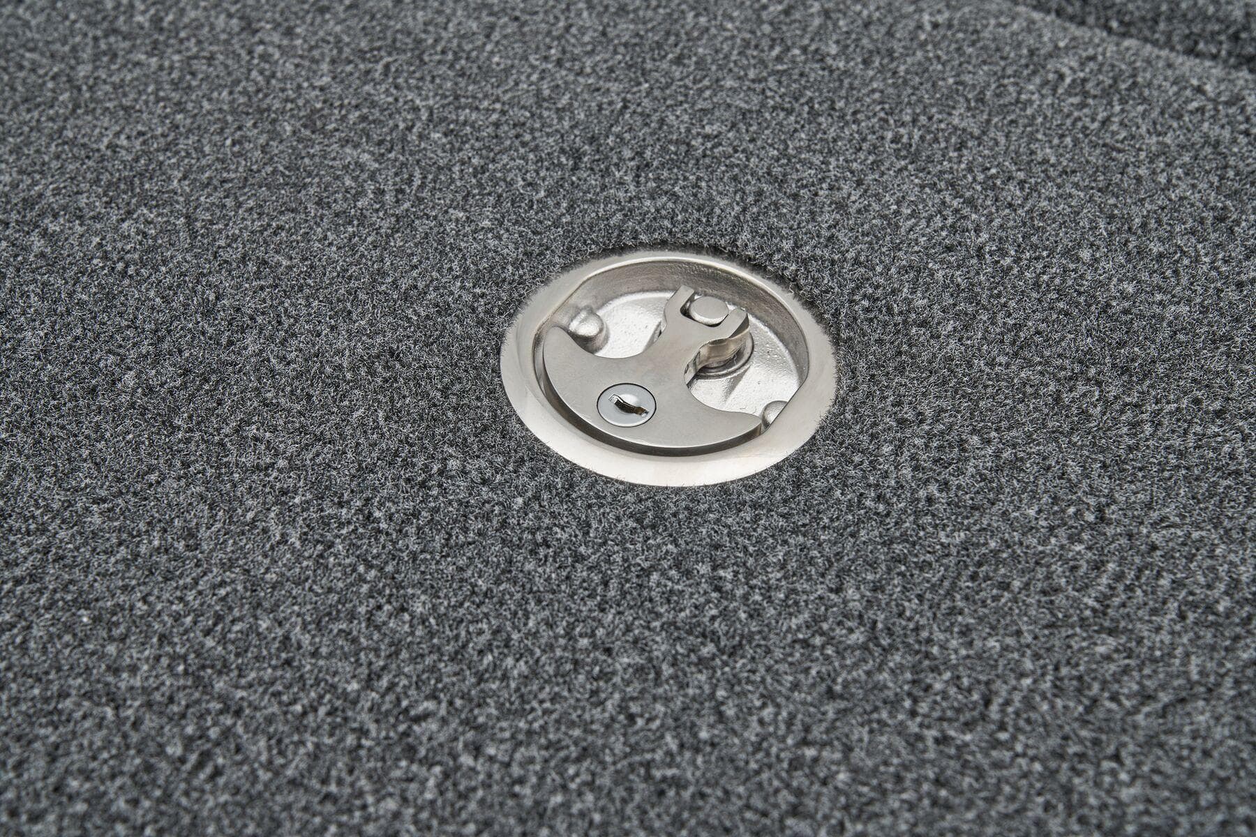 Manufacturer Provided Image: 2026 Ranger Z185 boat deck with a metal latch on gray carpet.