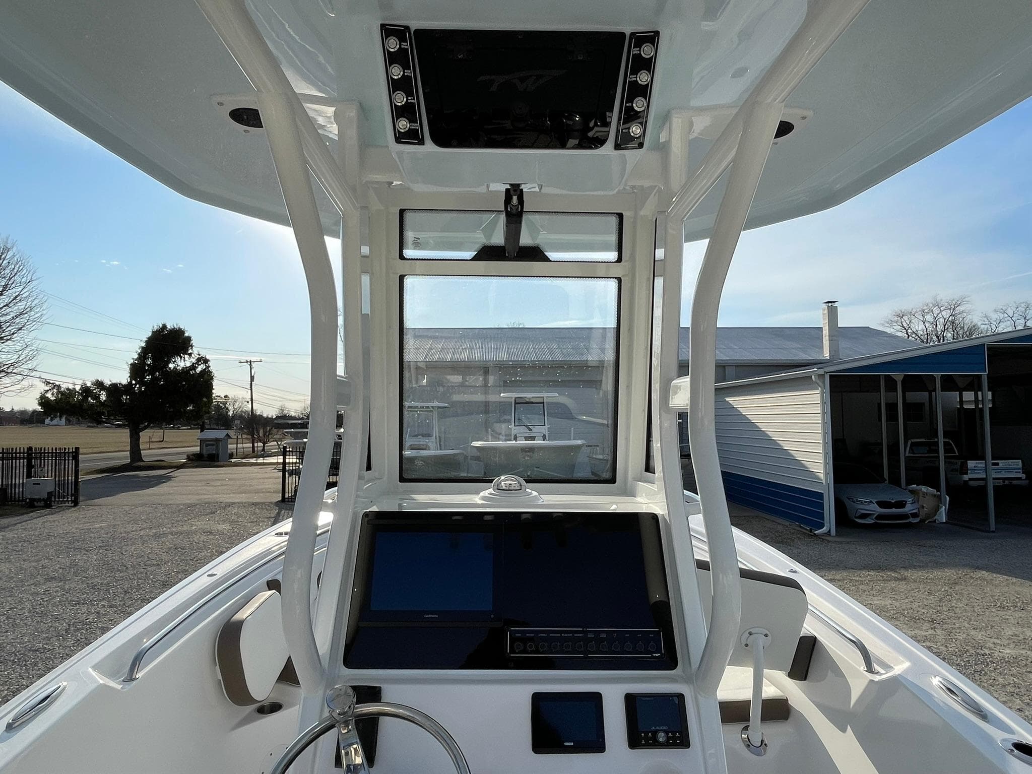 2025 Tidewater 232 SS boat console with modern navigation equipment and controls.