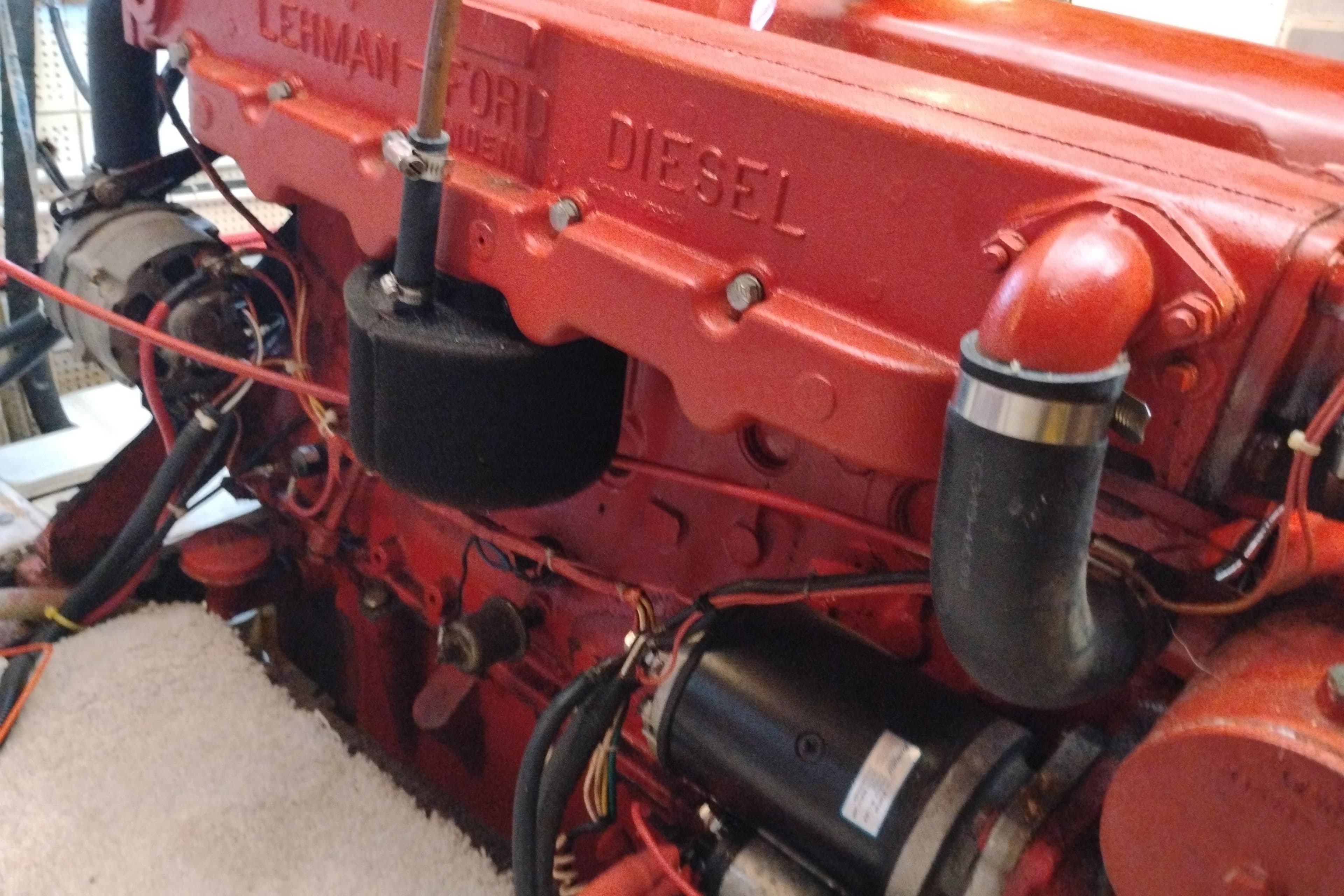 Red Lehman Ford diesel engine in a 1978 Puget 38 Europa Trawler.