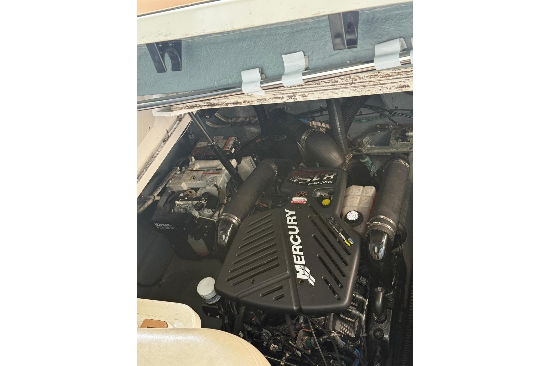 Engine compartment of a 2004 Sea Ray 340 Sundancer with Mercury engine.