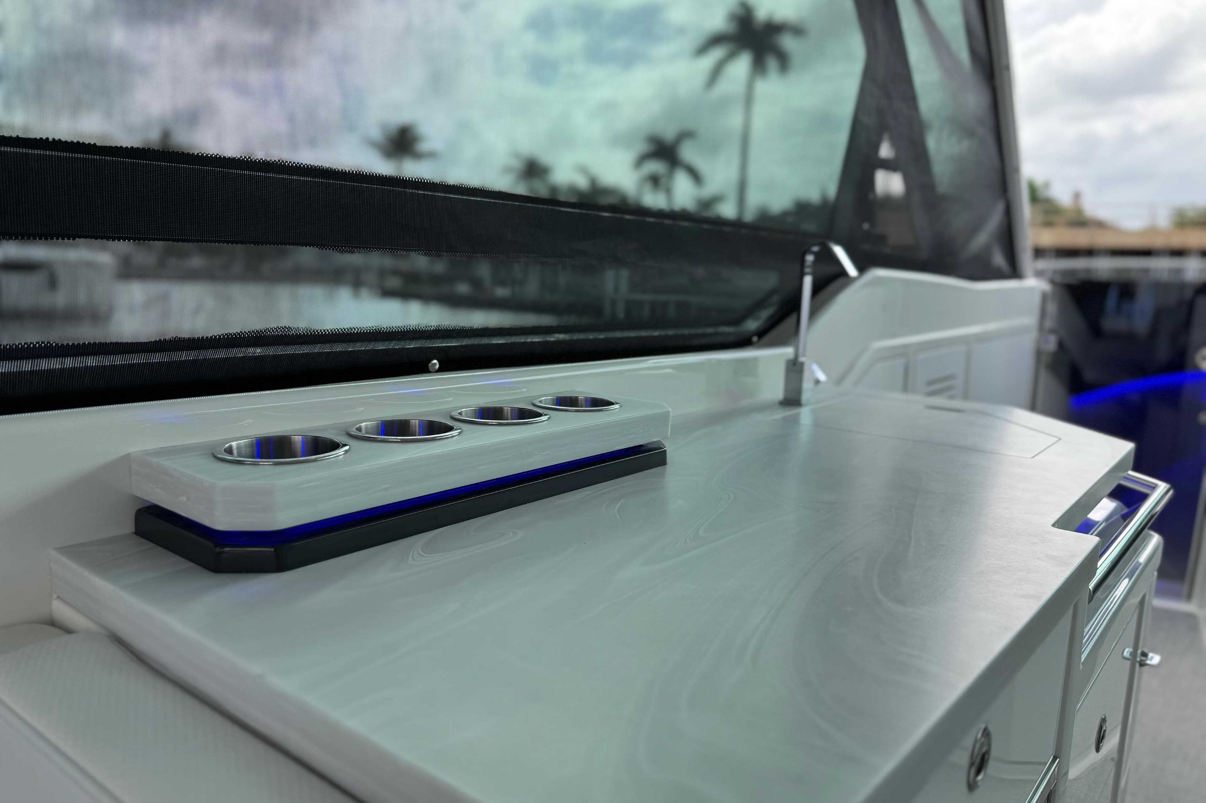 2023 Formula 400 Super Sport Crossover boat interior with sleek countertop and cup holders.