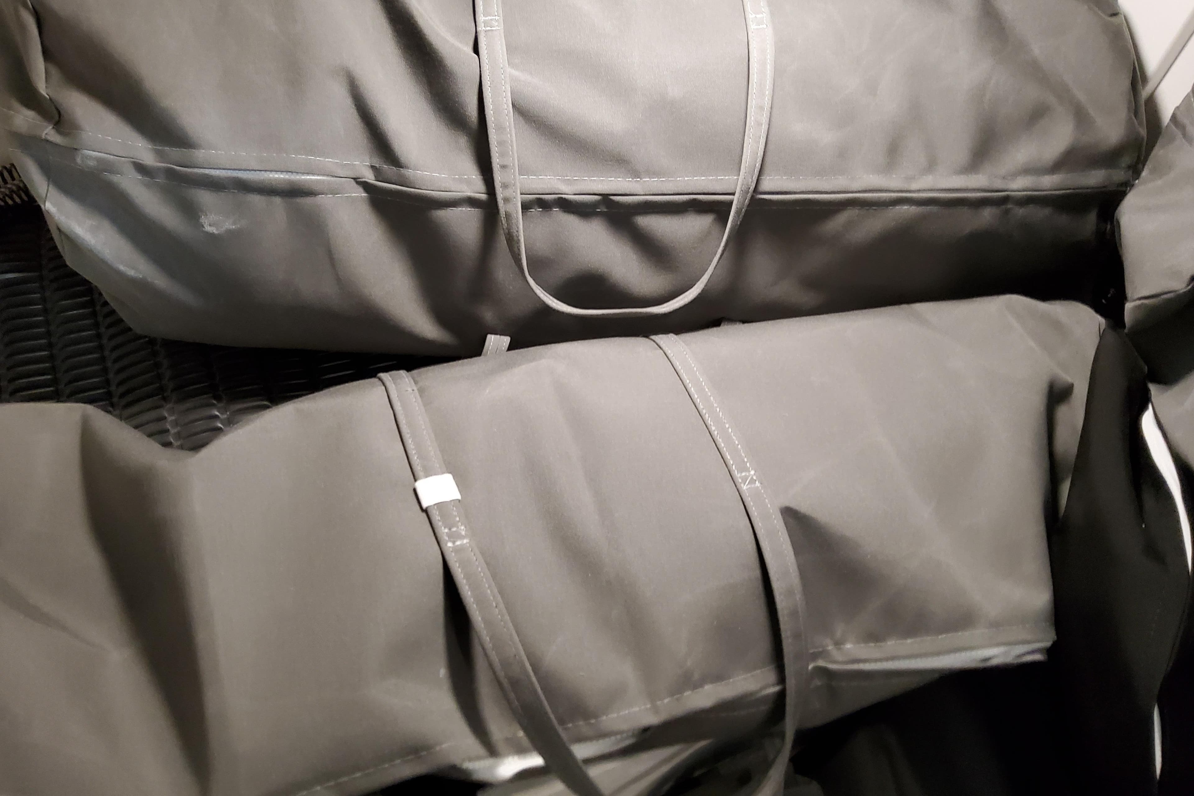Gray storage bags on a Formula 330 Crossover Bowrider OB, 2027 model.