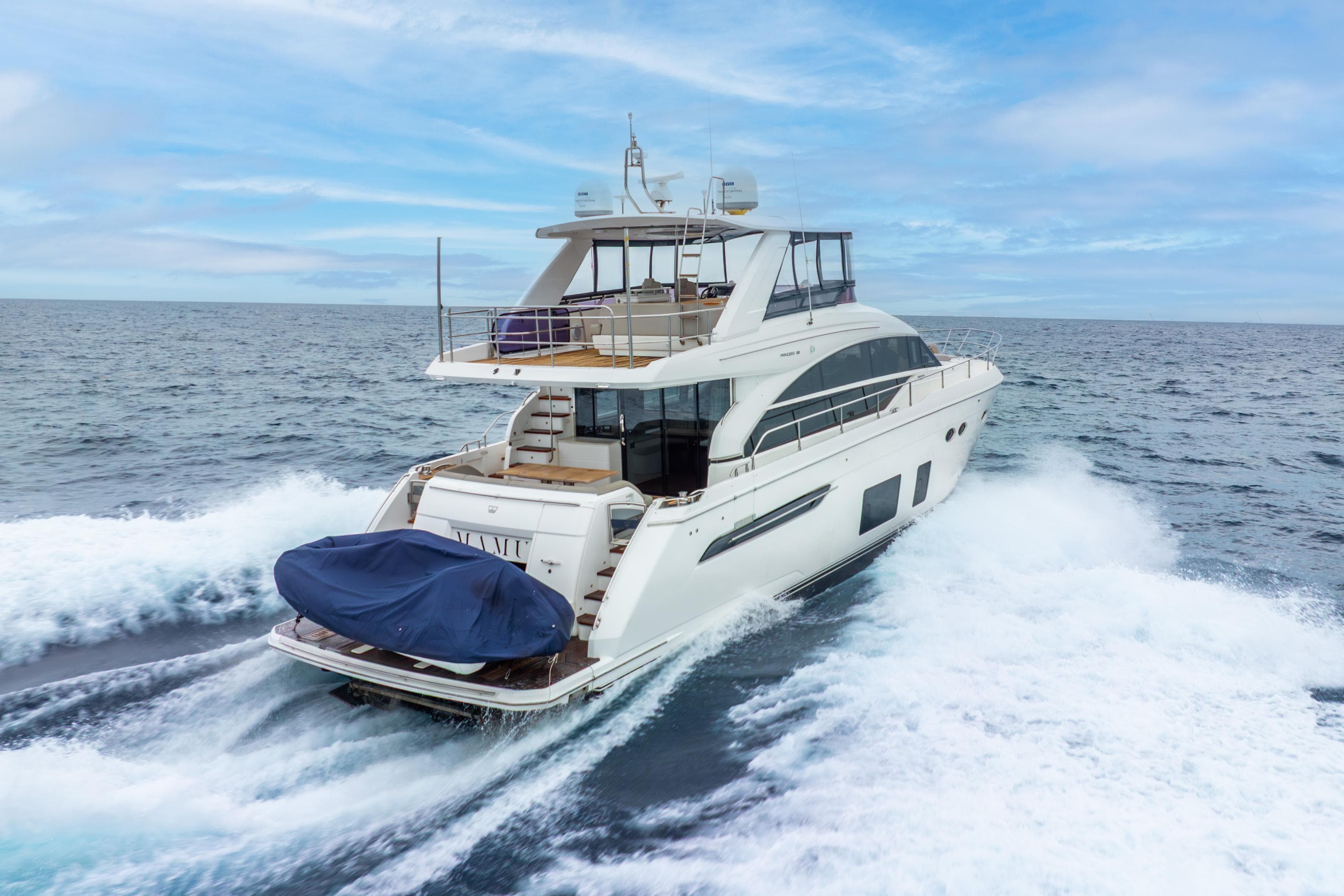 Luxury Princess F-68 yacht cruising on open sea, 2018 model.