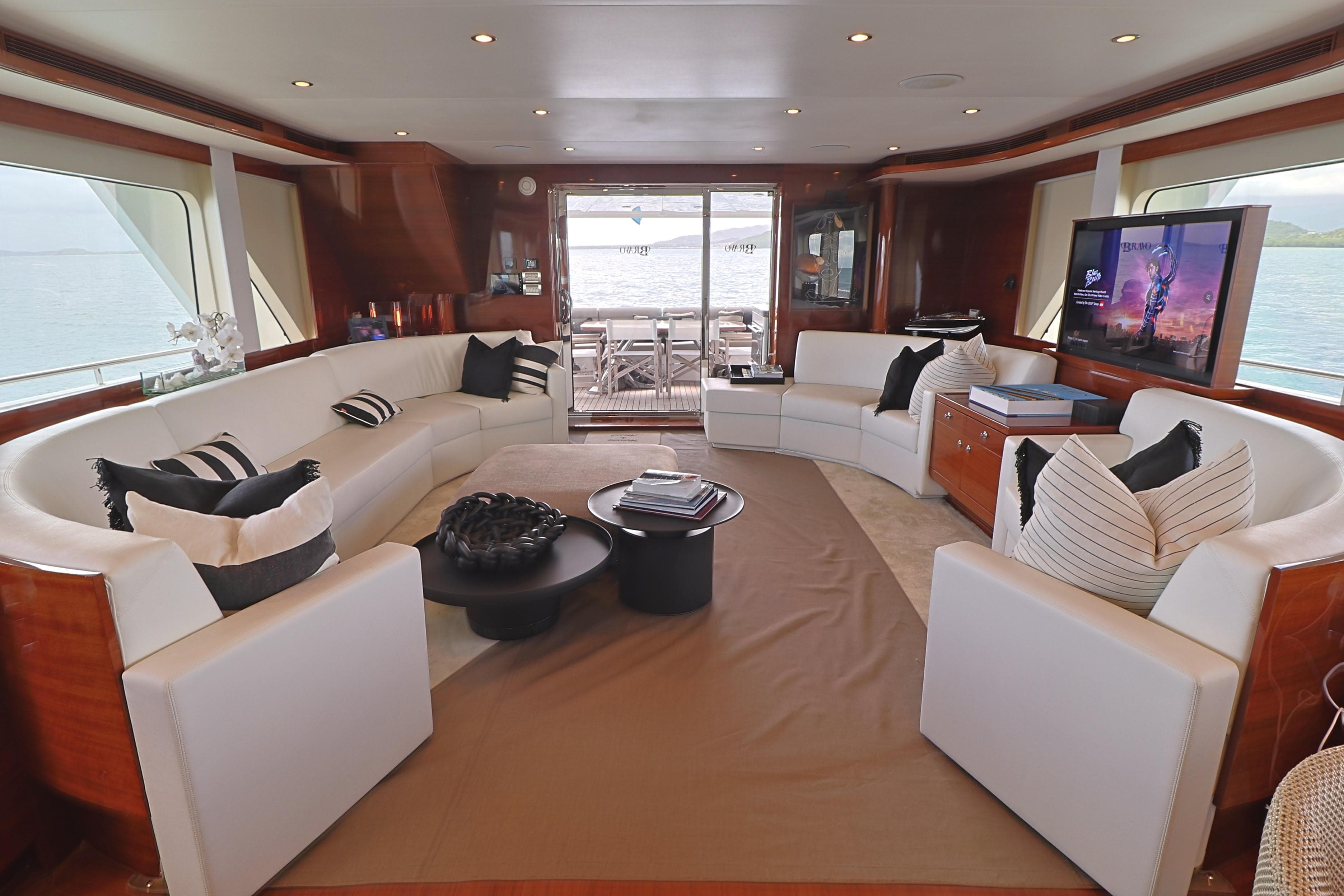 Luxurious 2013 Cheoy Lee Bravo yacht interior with elegant seating and modern decor.