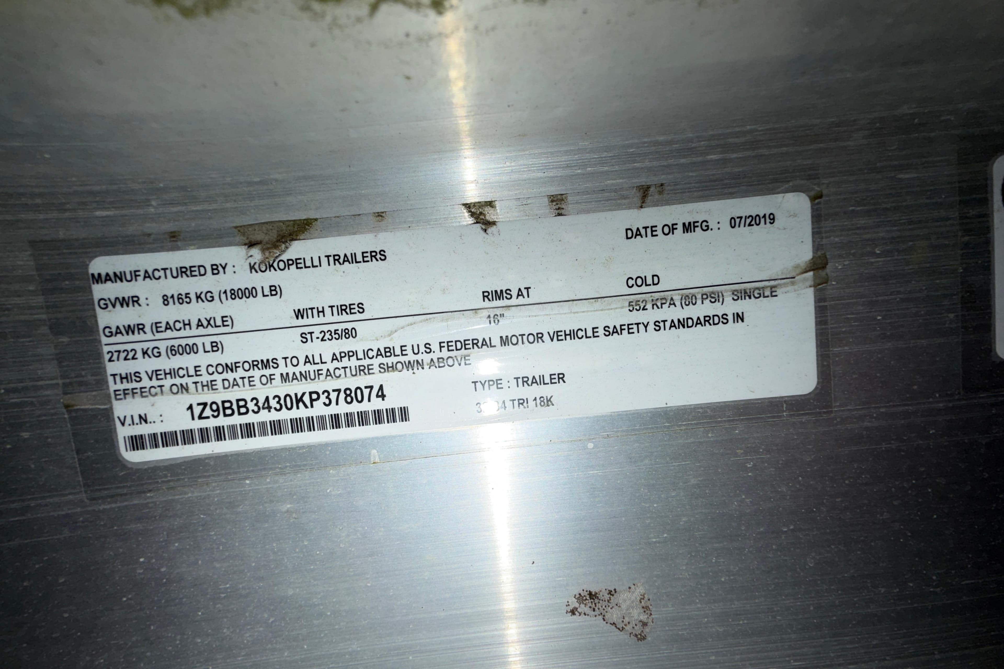 Label on Kokopelli trailer showing specifications and VIN, manufactured July 2019.