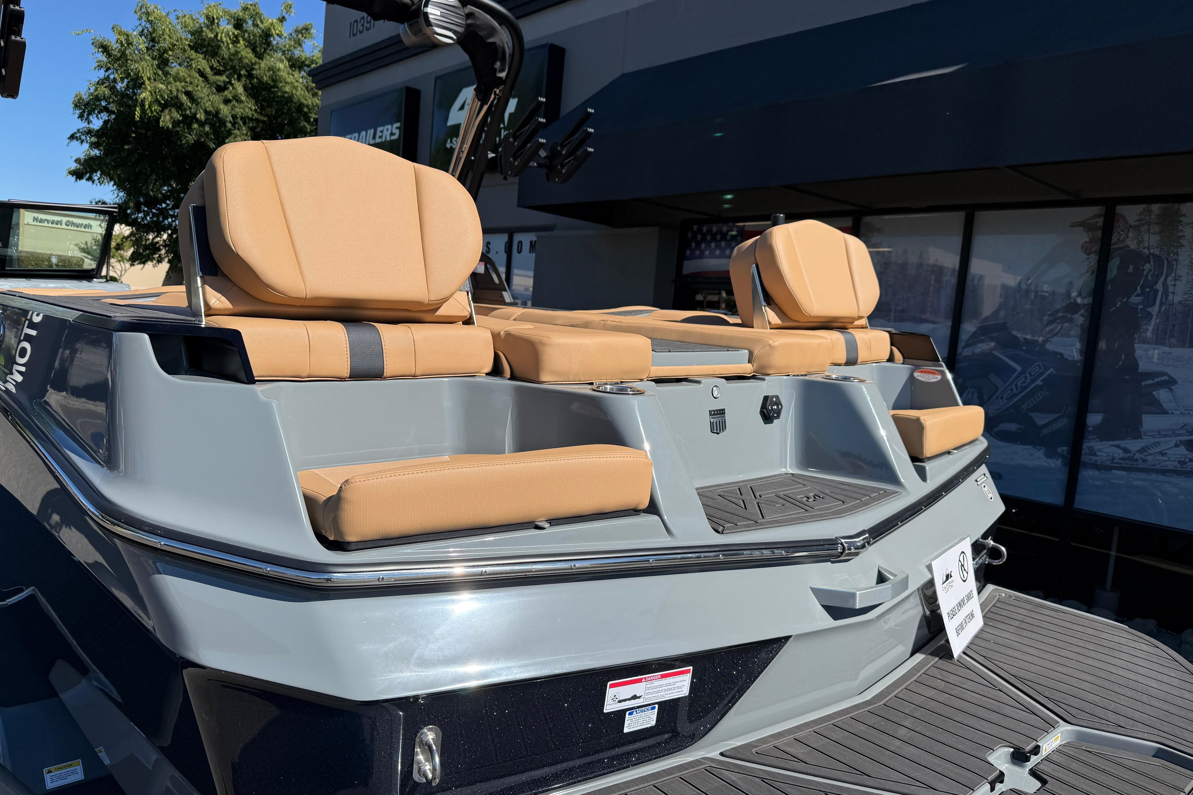 2026 MasterCraft XT24 boat with tan seating and sleek design.