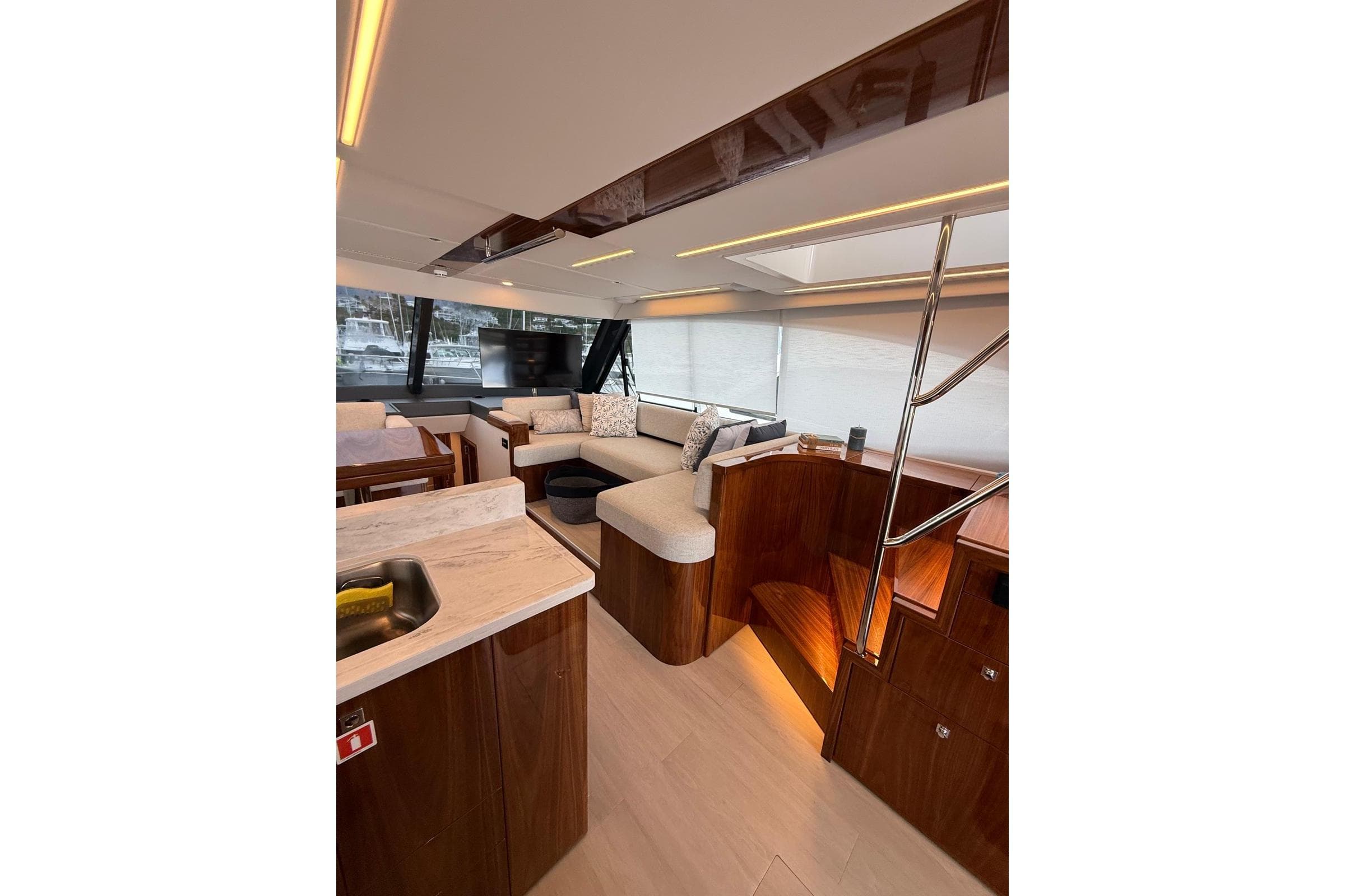 Luxurious interior of 2025 Riviera 50 Sports Motor Yacht with modern furnishings and elegant design.