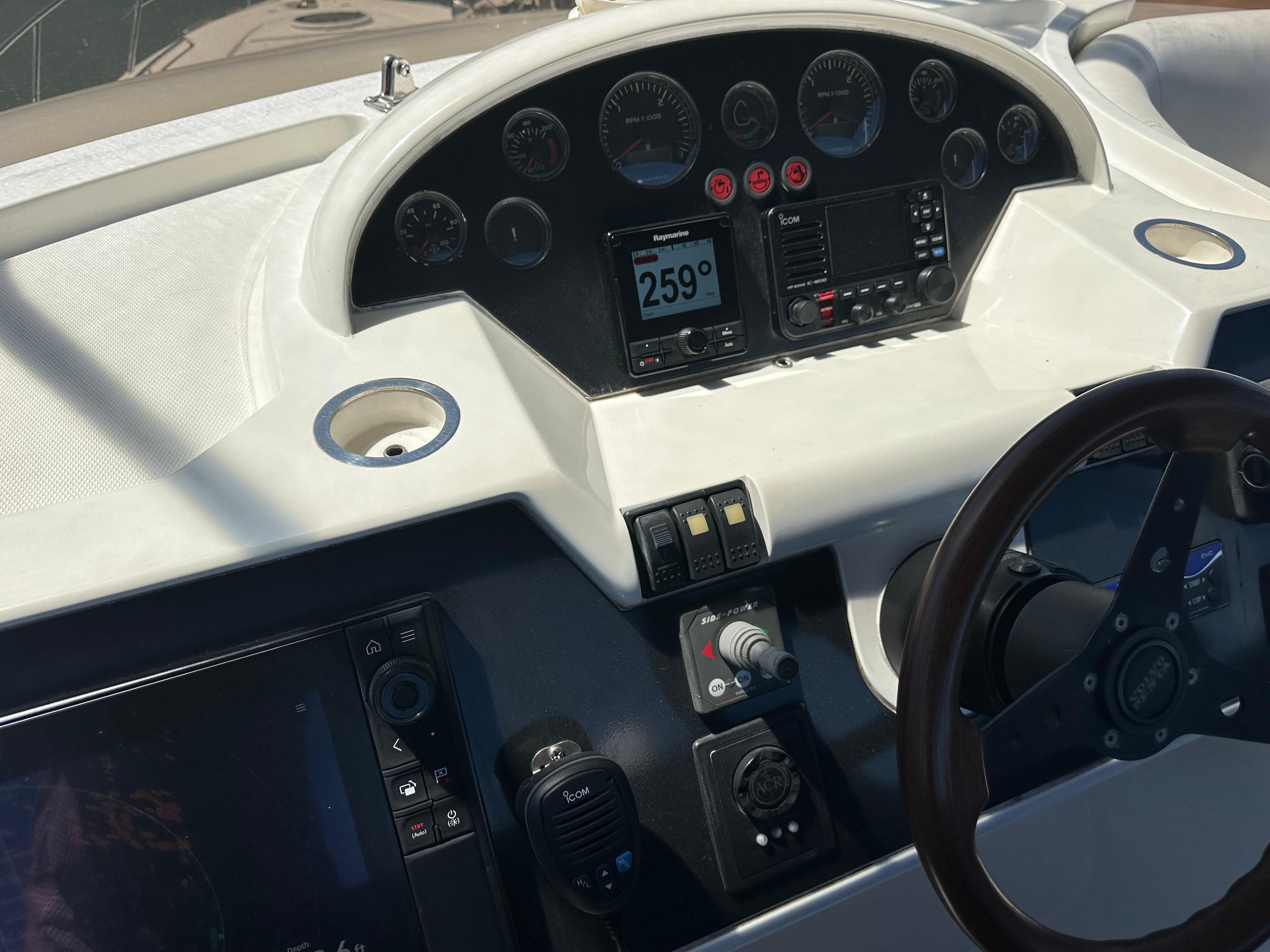 2007 Viking Sport Cruiser dashboard with navigation instruments and steering wheel.