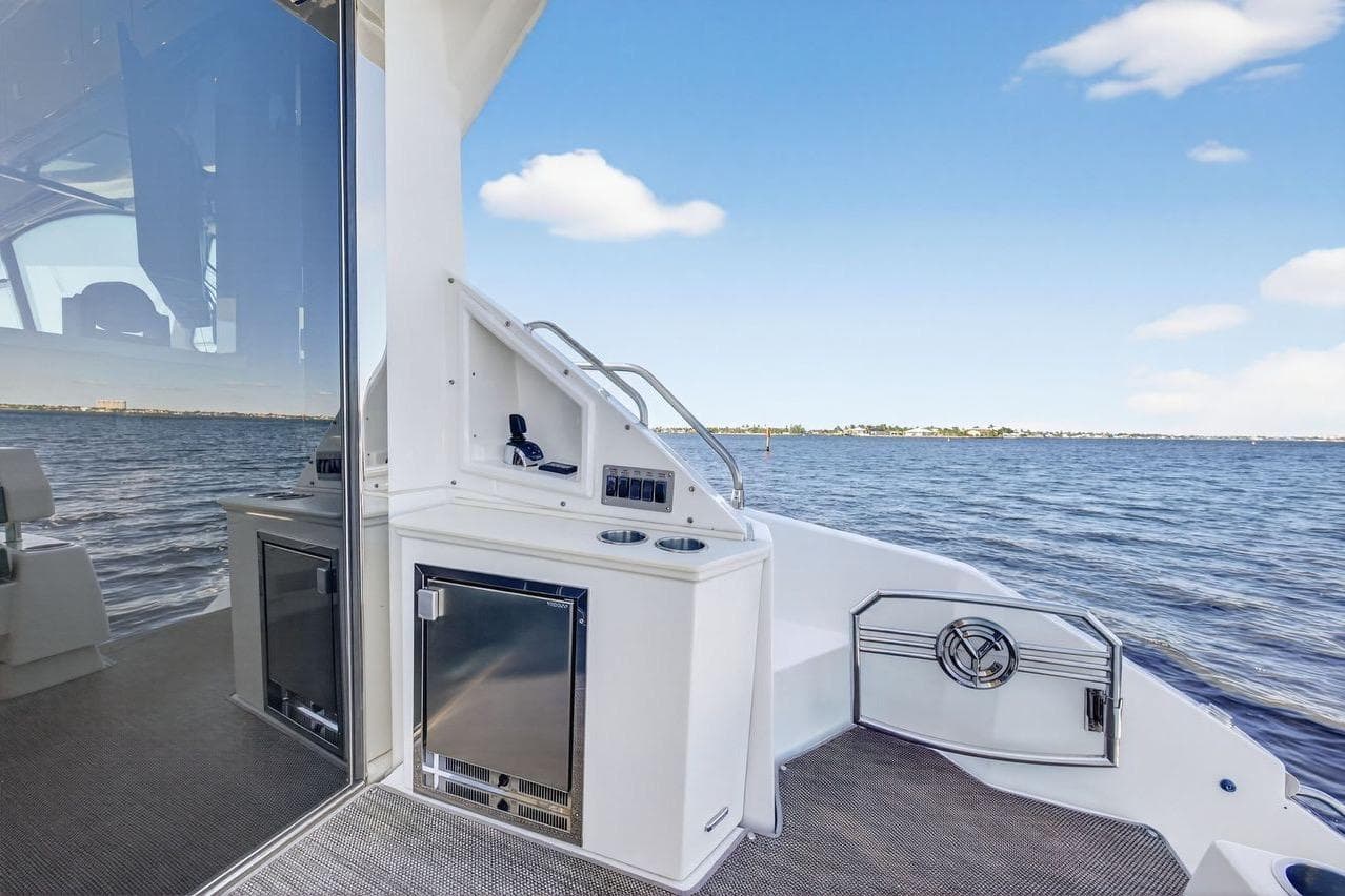 2020 Cruisers Yachts 50 Cantius deck with ocean view and sleek design.