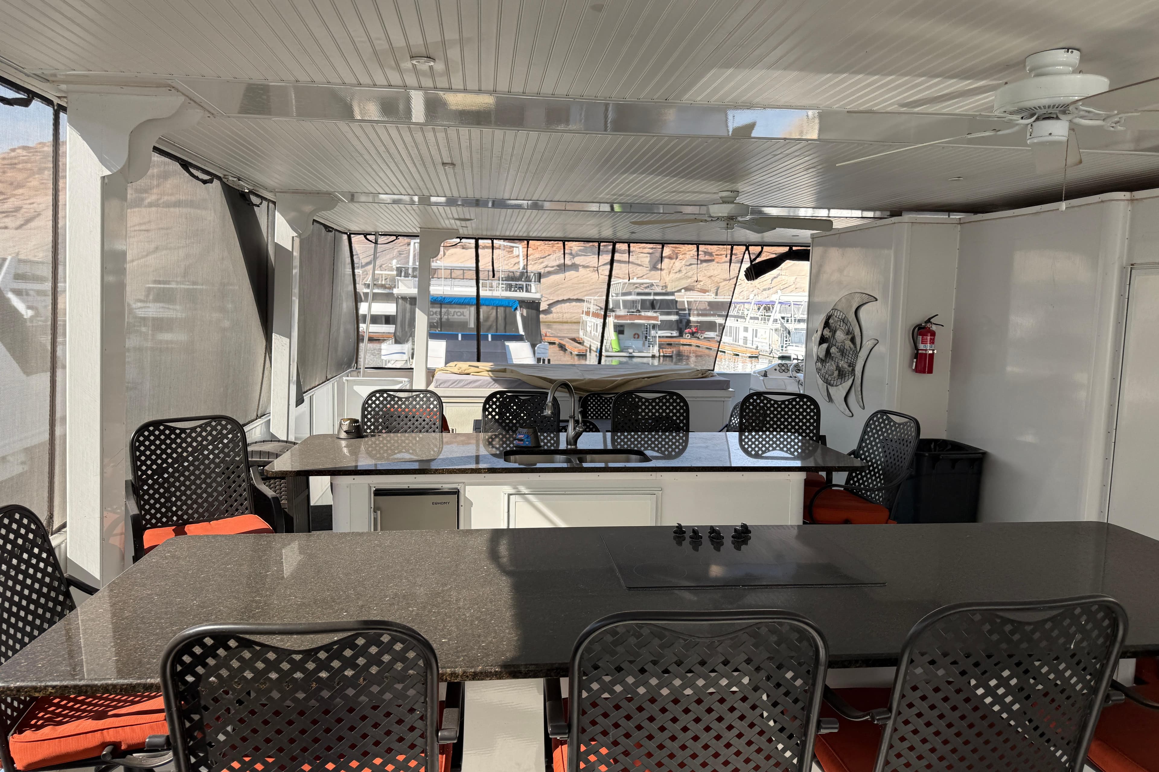 Spacious dining area on 2015 STARDUST Oceans Share #2 houseboat with modern furnishings.