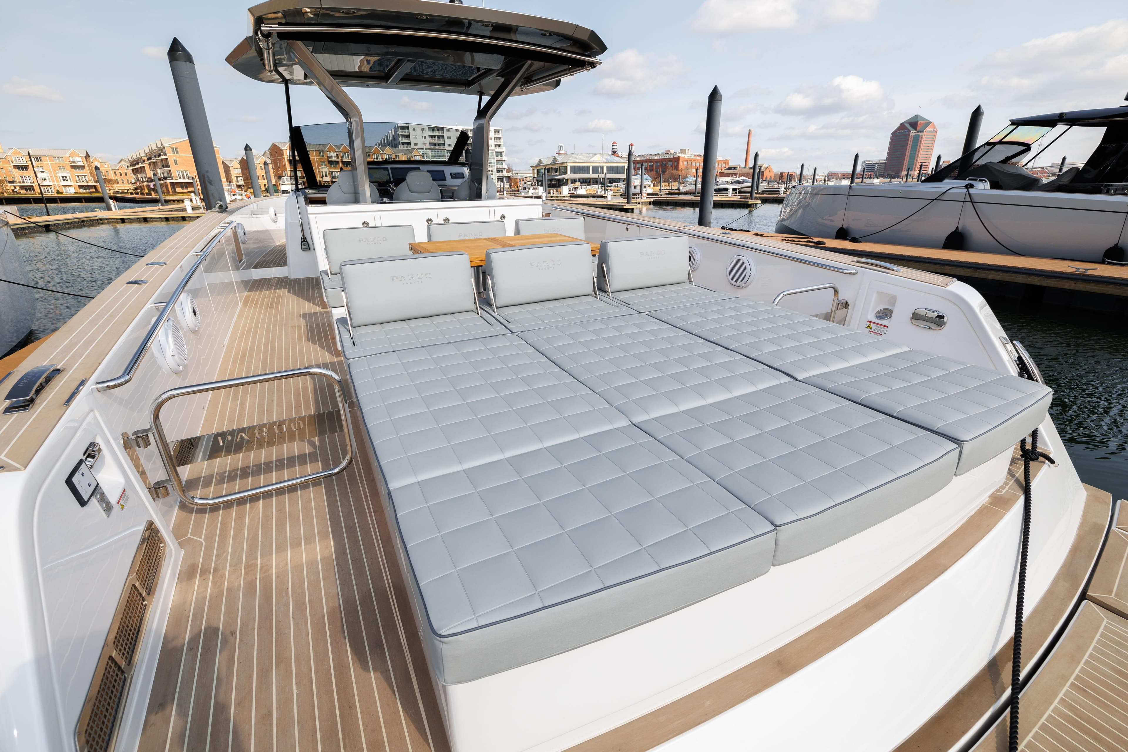 2024 Pardo Yachts 43 luxury yacht with spacious sunbathing area docked at marina.