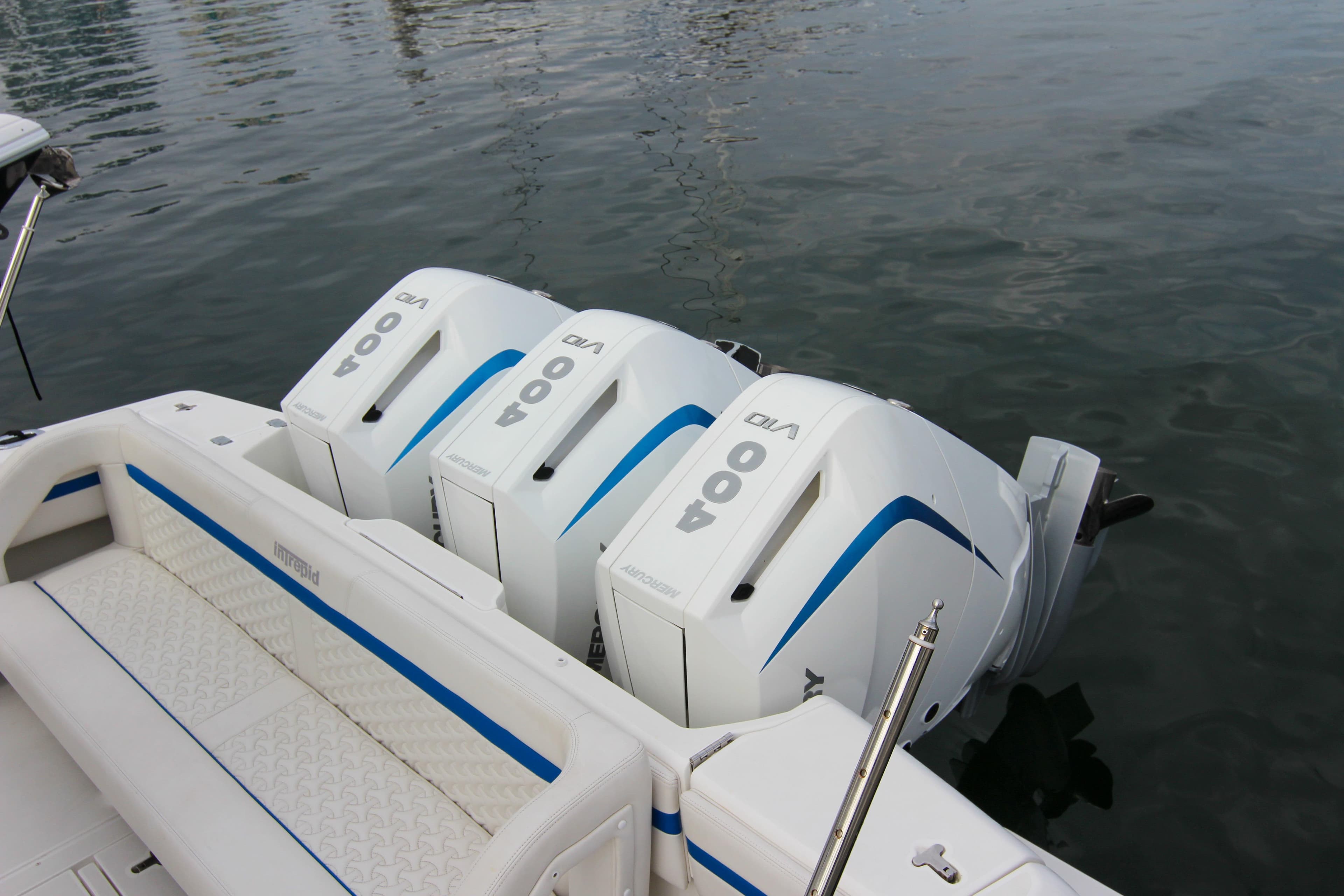 2003 Intrepid 377 Walkaround with triple 400 V8 outboard engines on calm water.