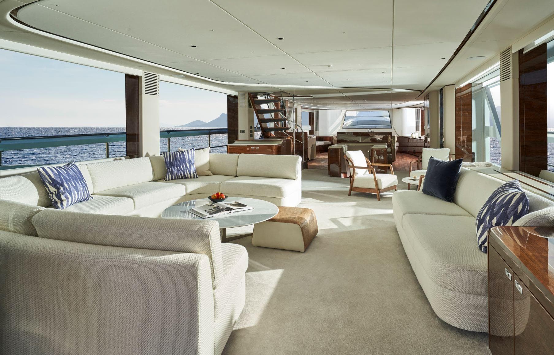 Luxurious interior of 2025 Princess X95 yacht with elegant seating and ocean views.