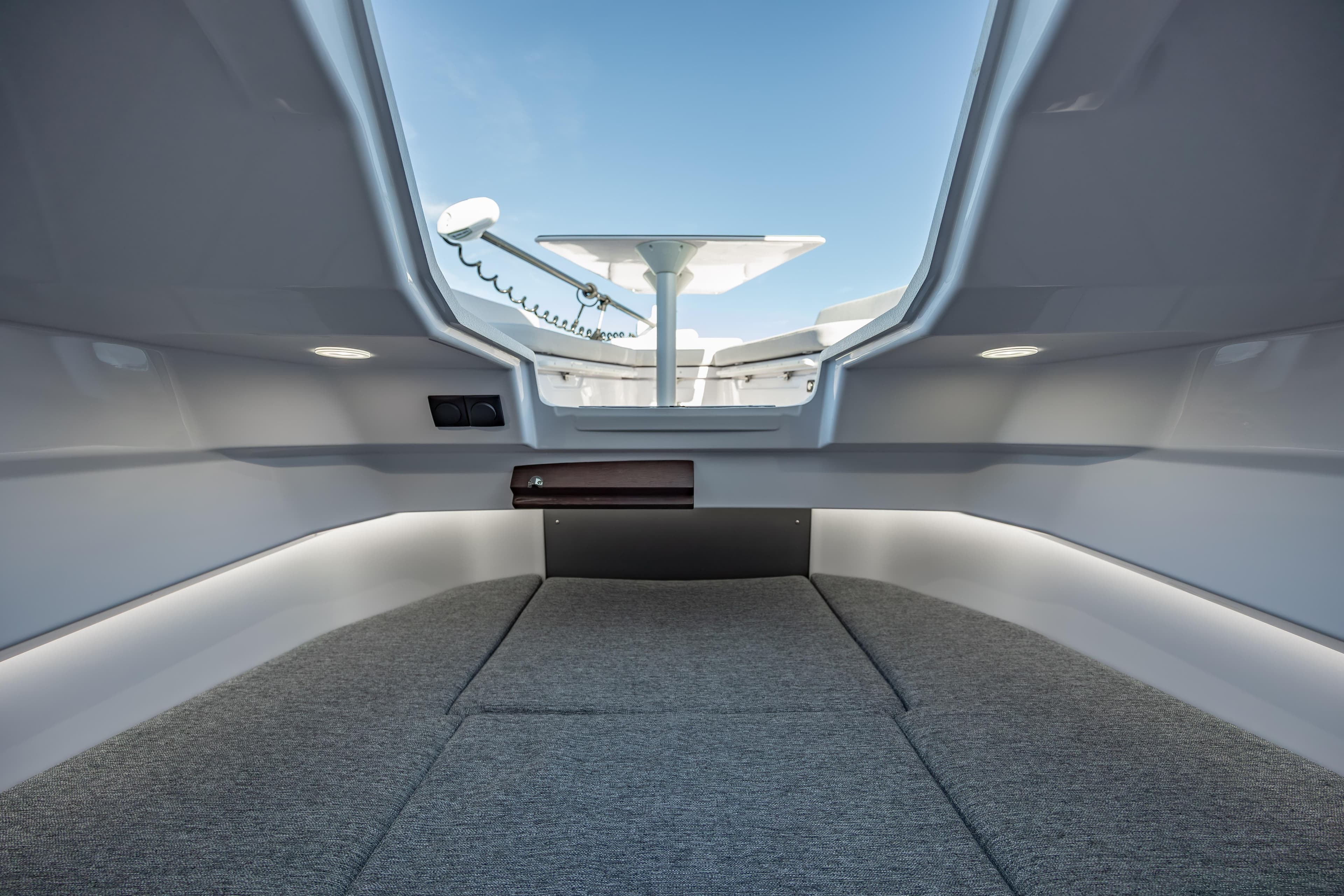 Interior cabin of 2025 Axopar 29 CCX boat with modern design.