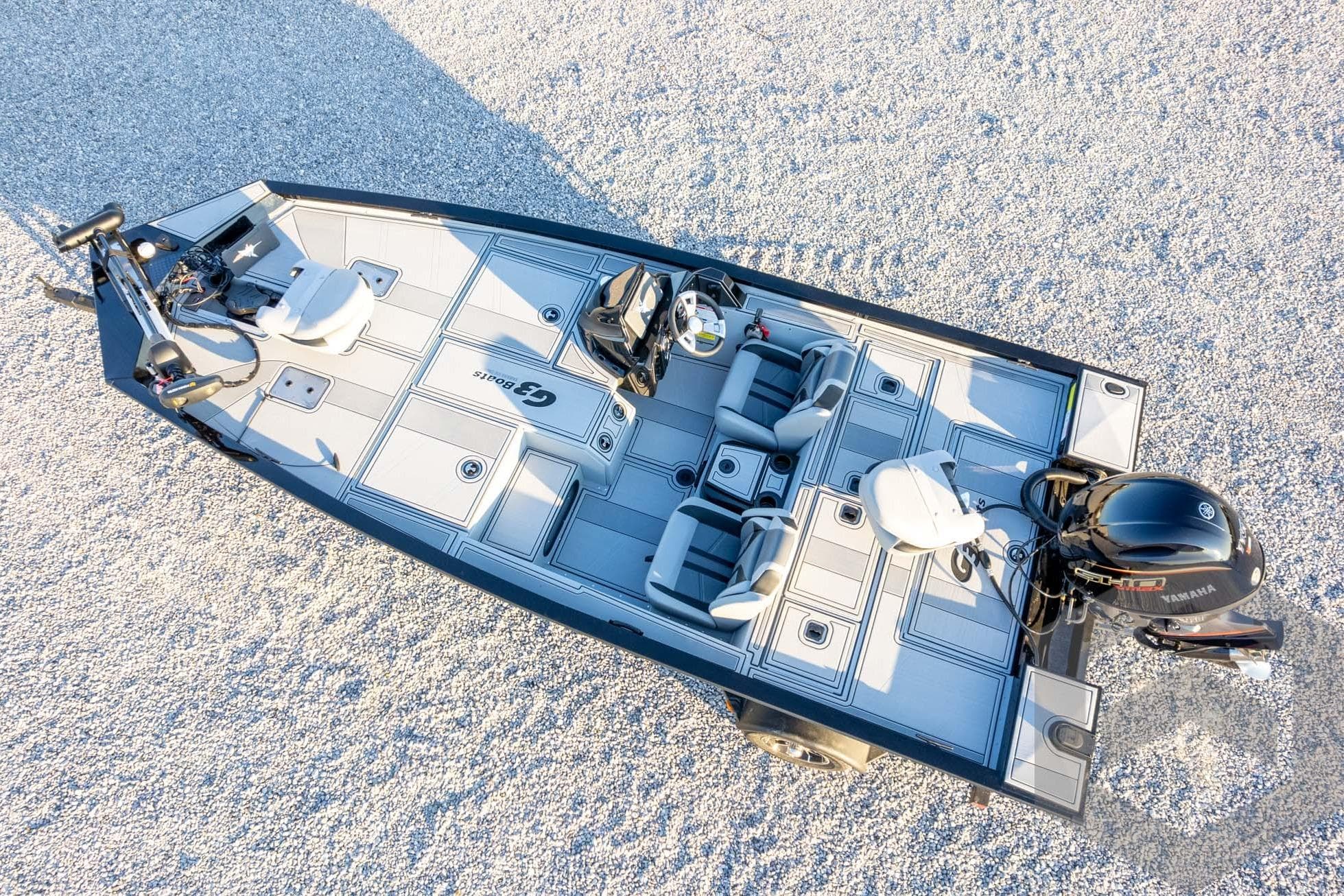 2026 G3 Sportsman 1810 SE fishing boat with Yamaha motor, aerial view.