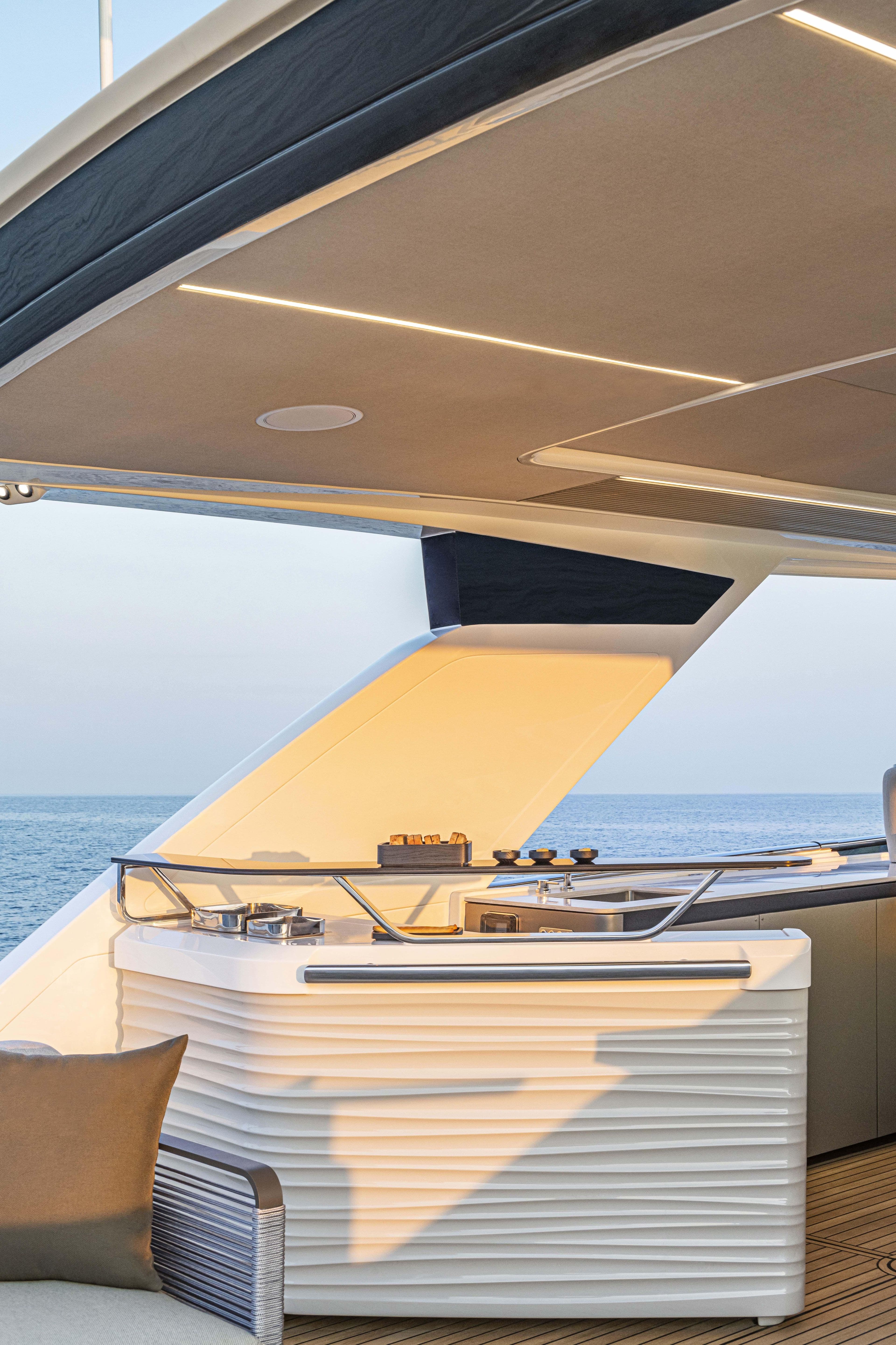 Luxurious 2026 Absolute 70' Navetta yacht deck with modern design and ocean view.