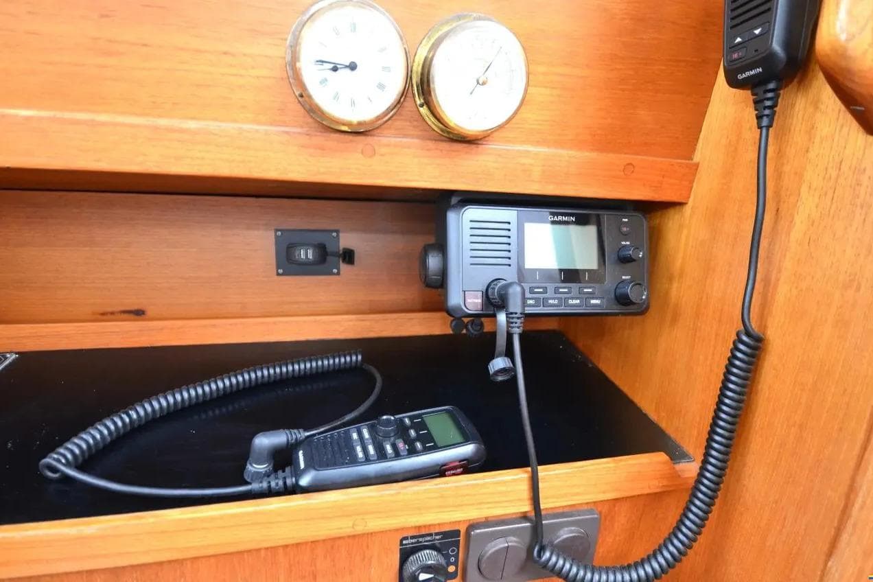 1991 Nauticat 32 interior with Garmin radio and navigation equipment.