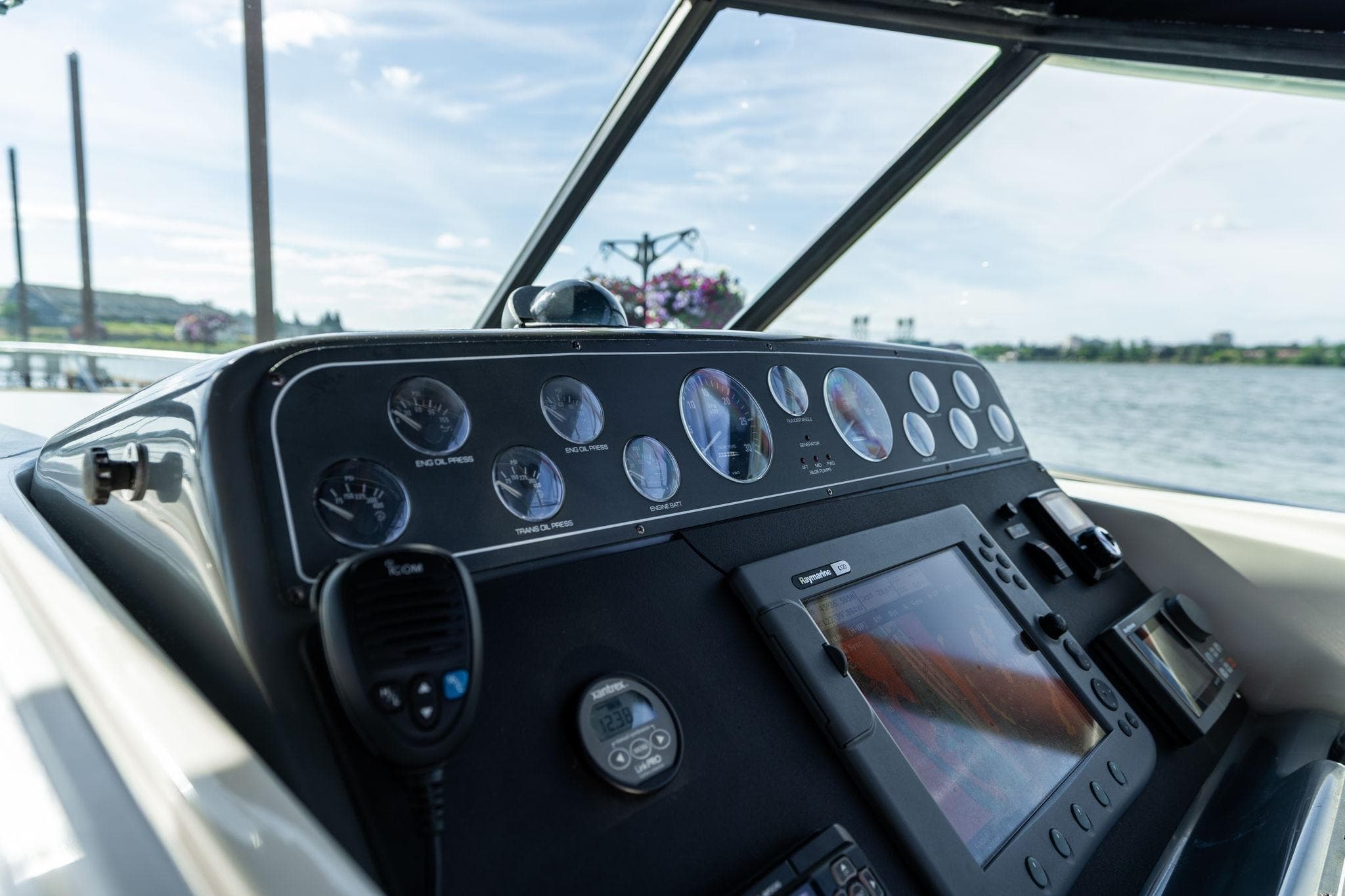 Dashboard of a 1998 Tiara Yachts 3500 Express with gauges and navigation equipment.