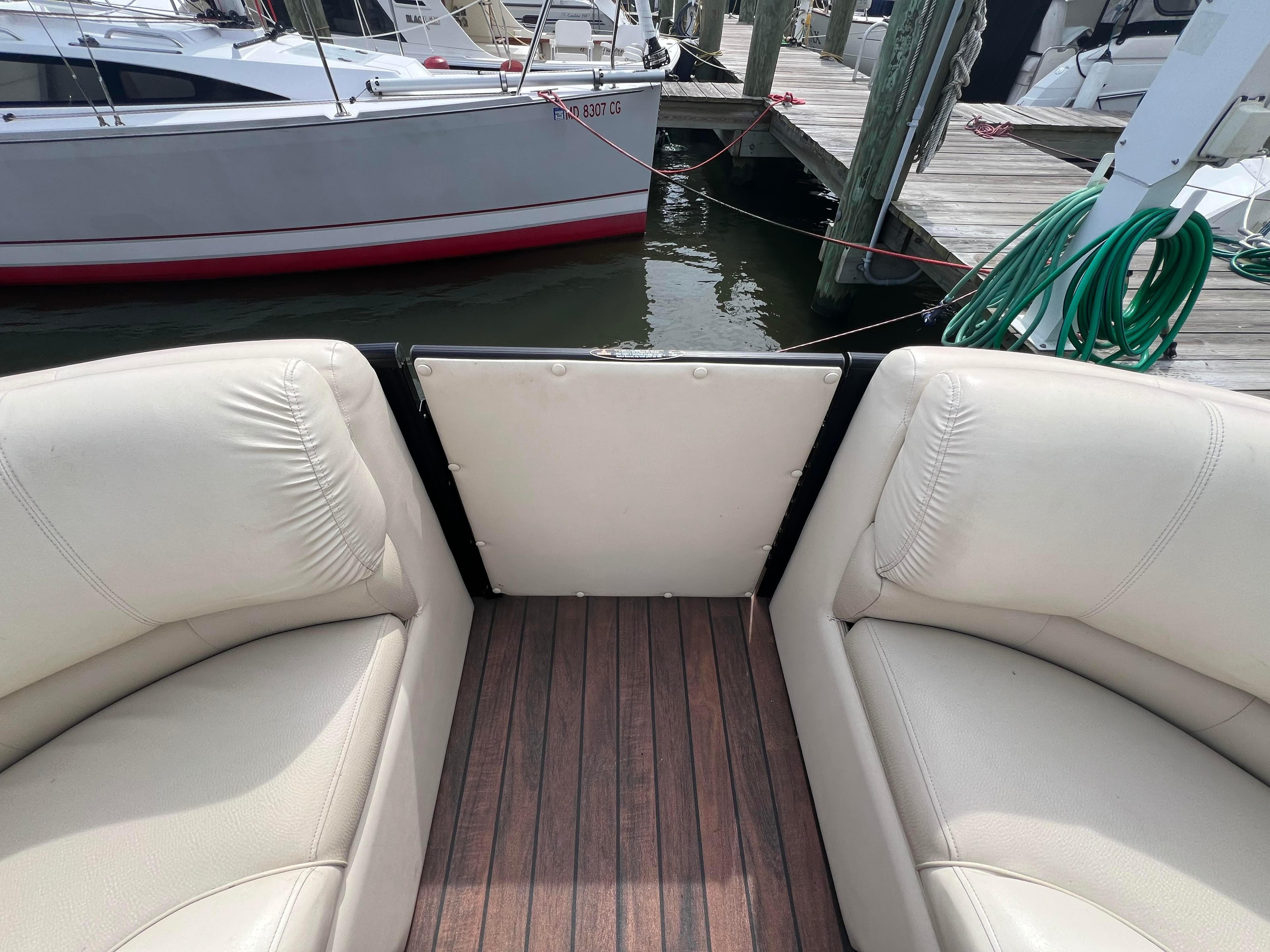 Interior of a 2015 Harris FloteBote Grand Mariner SL 250 at dock.