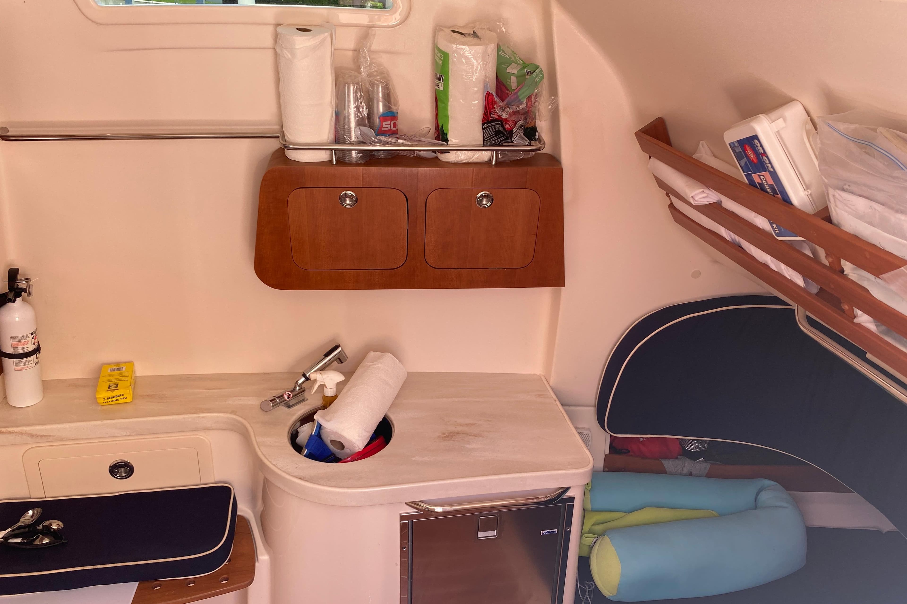 Interior of 2021 Grady-White Canyon 376 boat with storage and amenities.