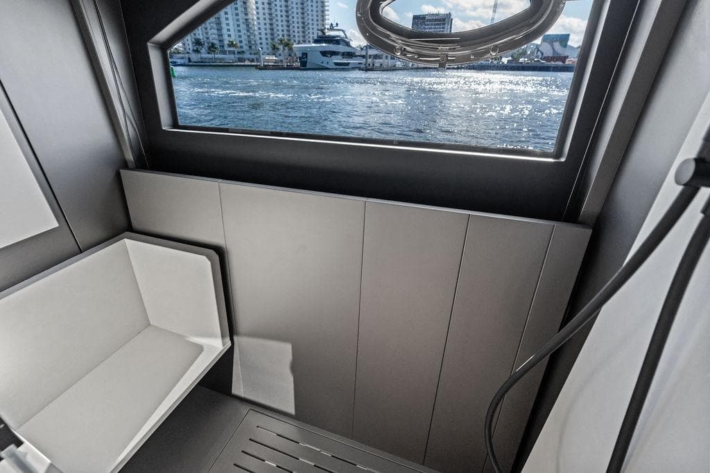Interior view of 2025 Pershing GTX 80 yacht, featuring modern design and waterfront scenery.