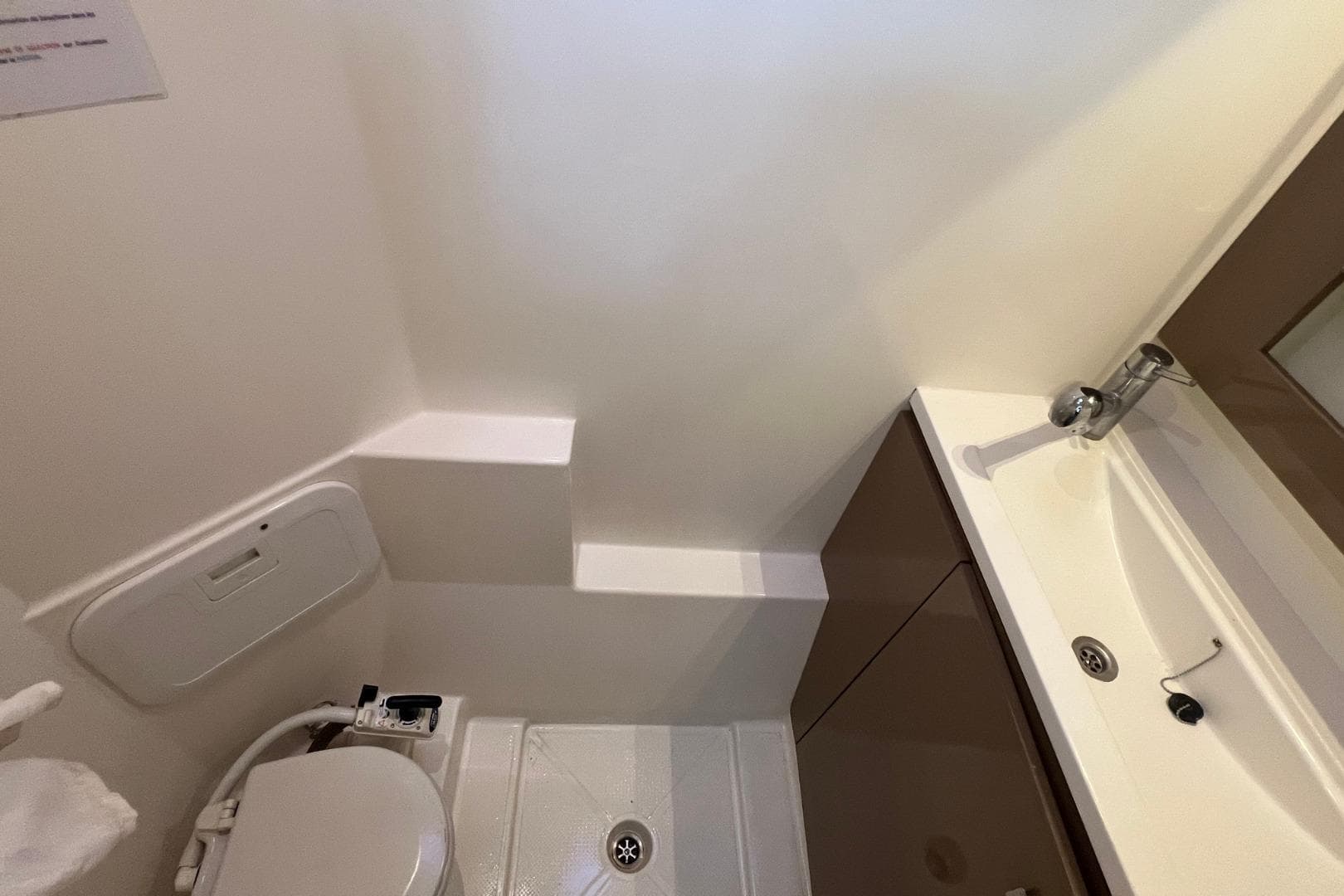 Bathroom interior of 2018 Fountaine Pajot MY 37 yacht, featuring sink and toilet.