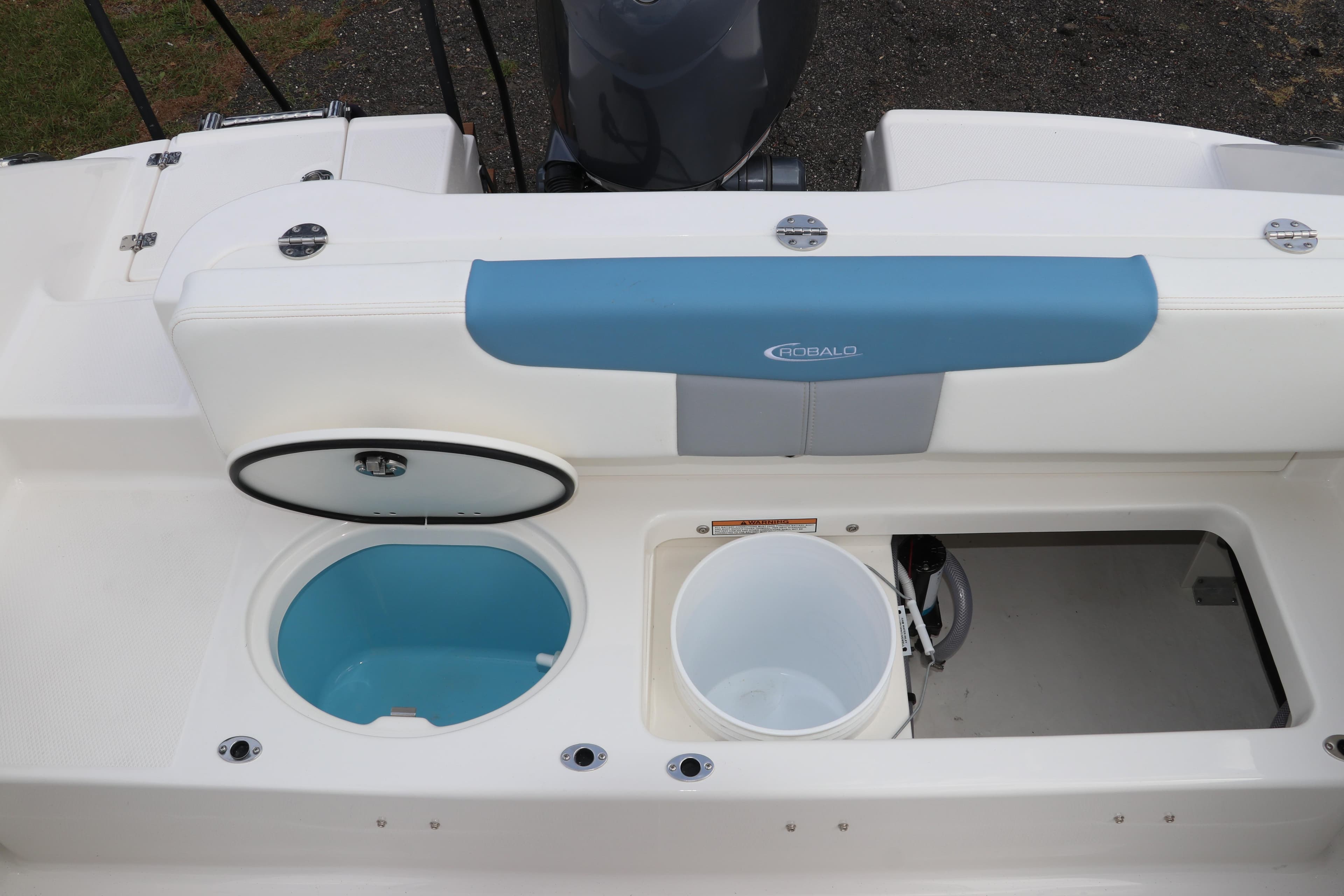 2026 Robalo R202 Explorer boat interior with storage compartments and seating.