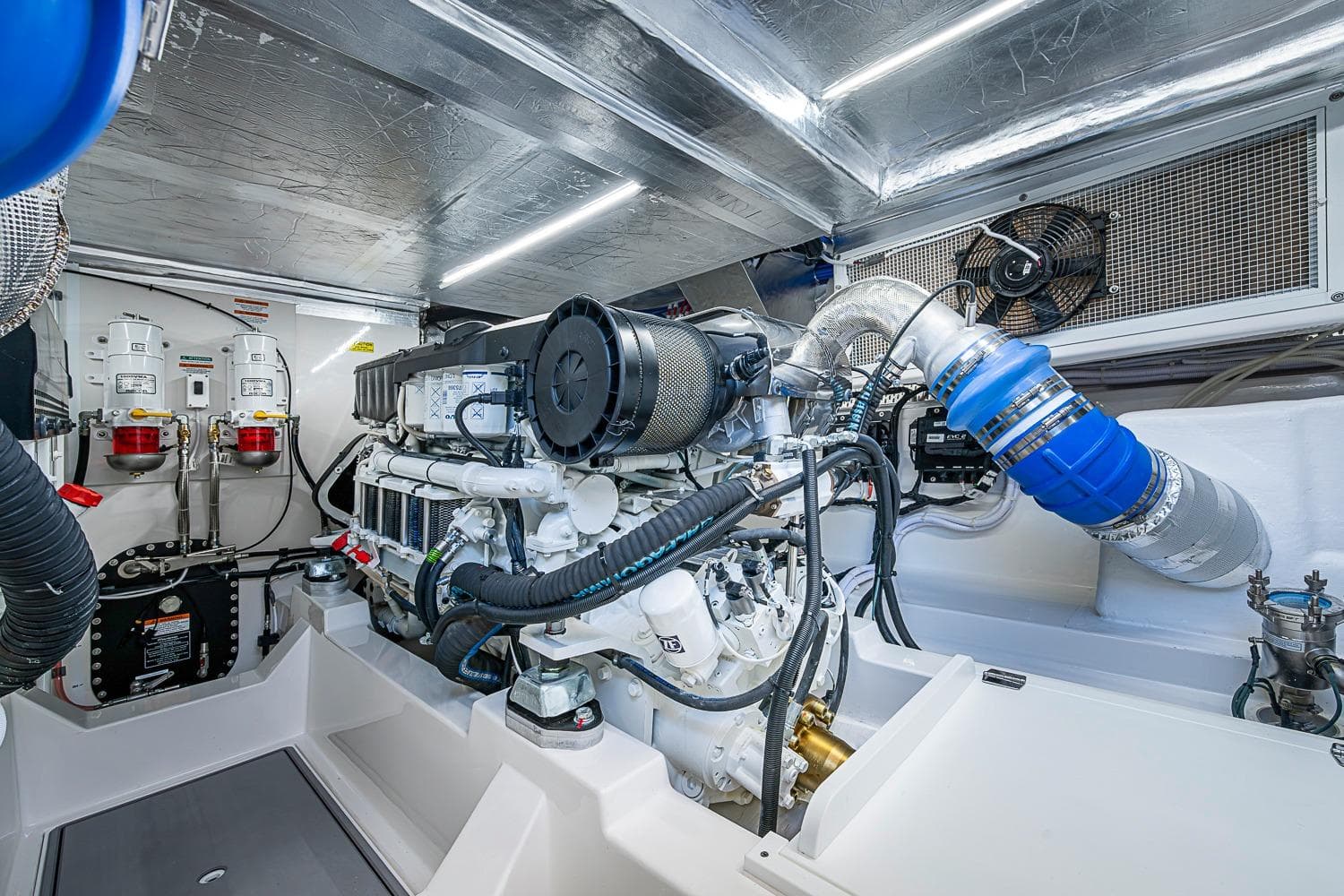 Engine room of 2026 Maritimo M50 yacht, showcasing advanced machinery and components.