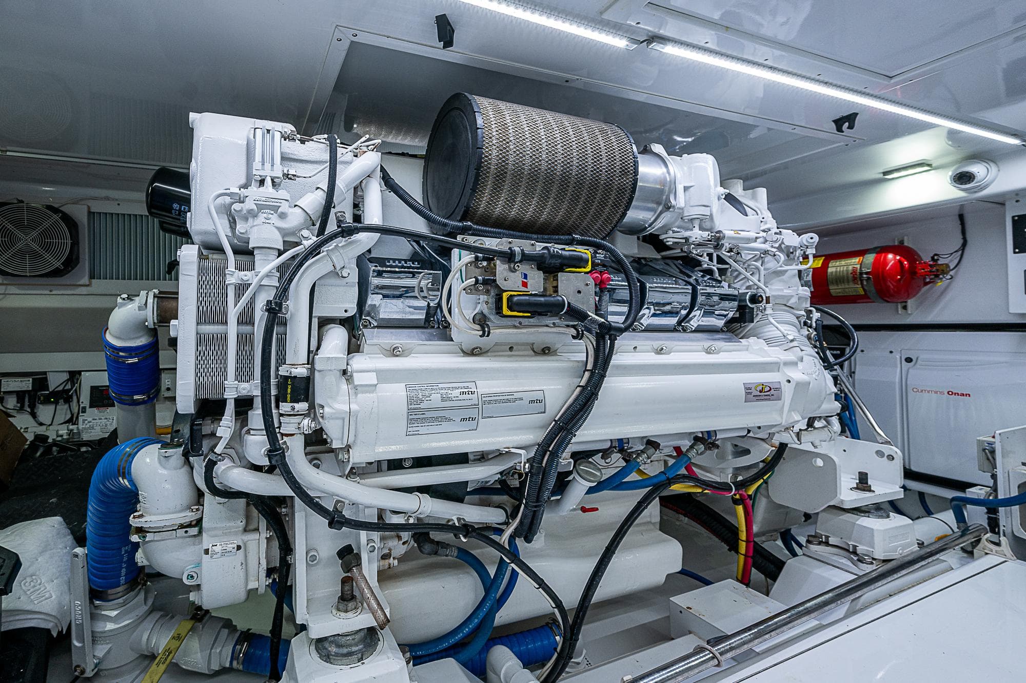 Engine room of 2017 F&S Custom Express Sportfish, showcasing advanced marine machinery.