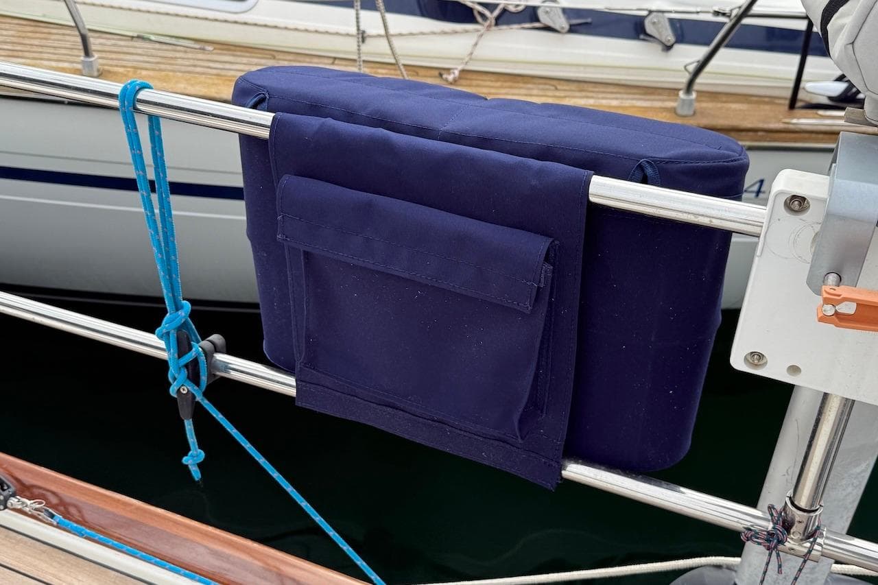 Blue fabric cover on a Moody 47 yacht railing, 2002 model.