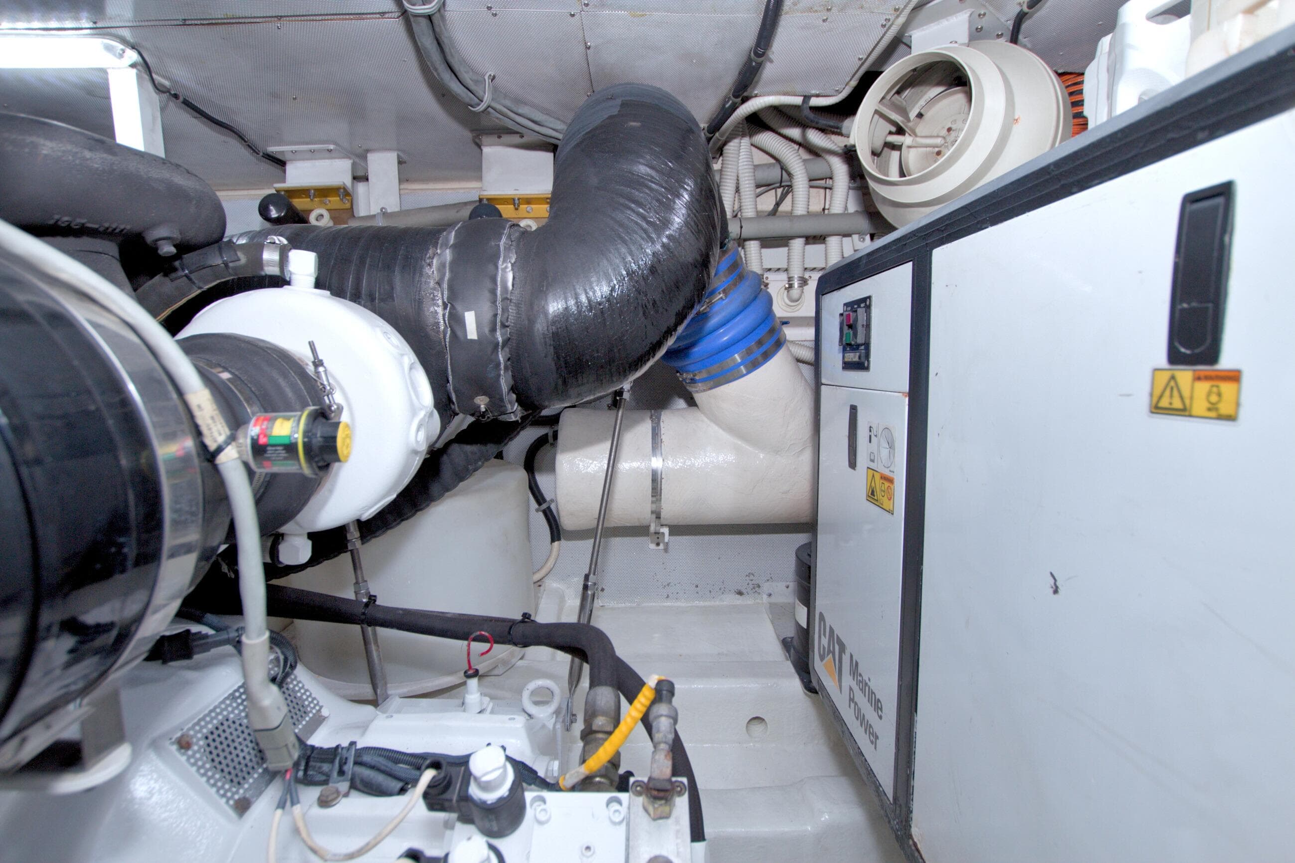Engine room of 2005 Neptunus 62 Flybridge yacht with CAT Marine Power system.