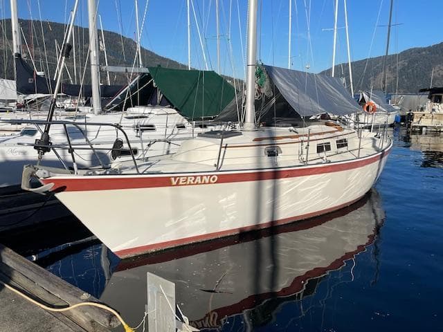 1981 Hinterhoeller Niagara sailboat docked on a sunny day.