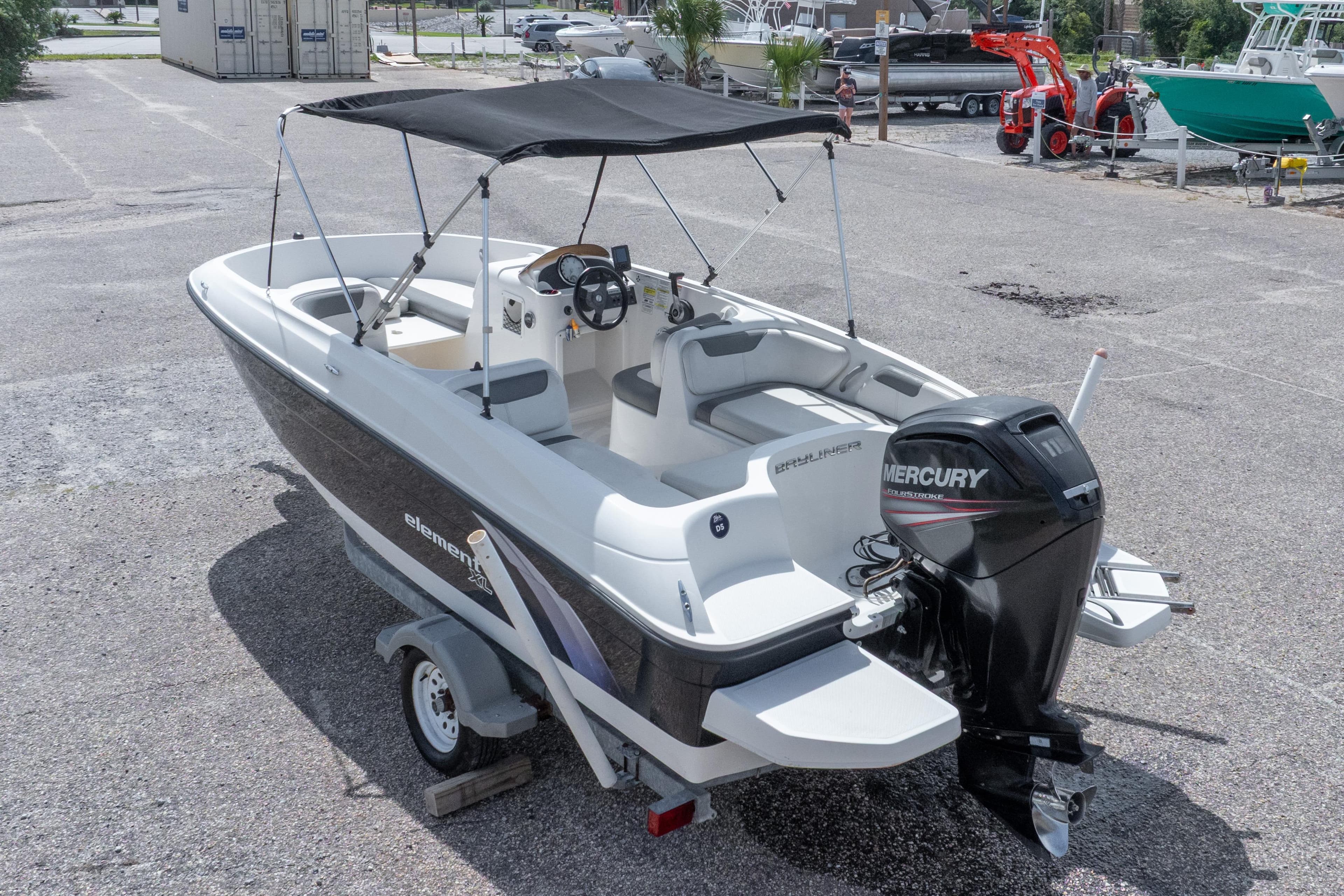 2015 Bayliner Element XL boat with Mercury outboard motor on a trailer.