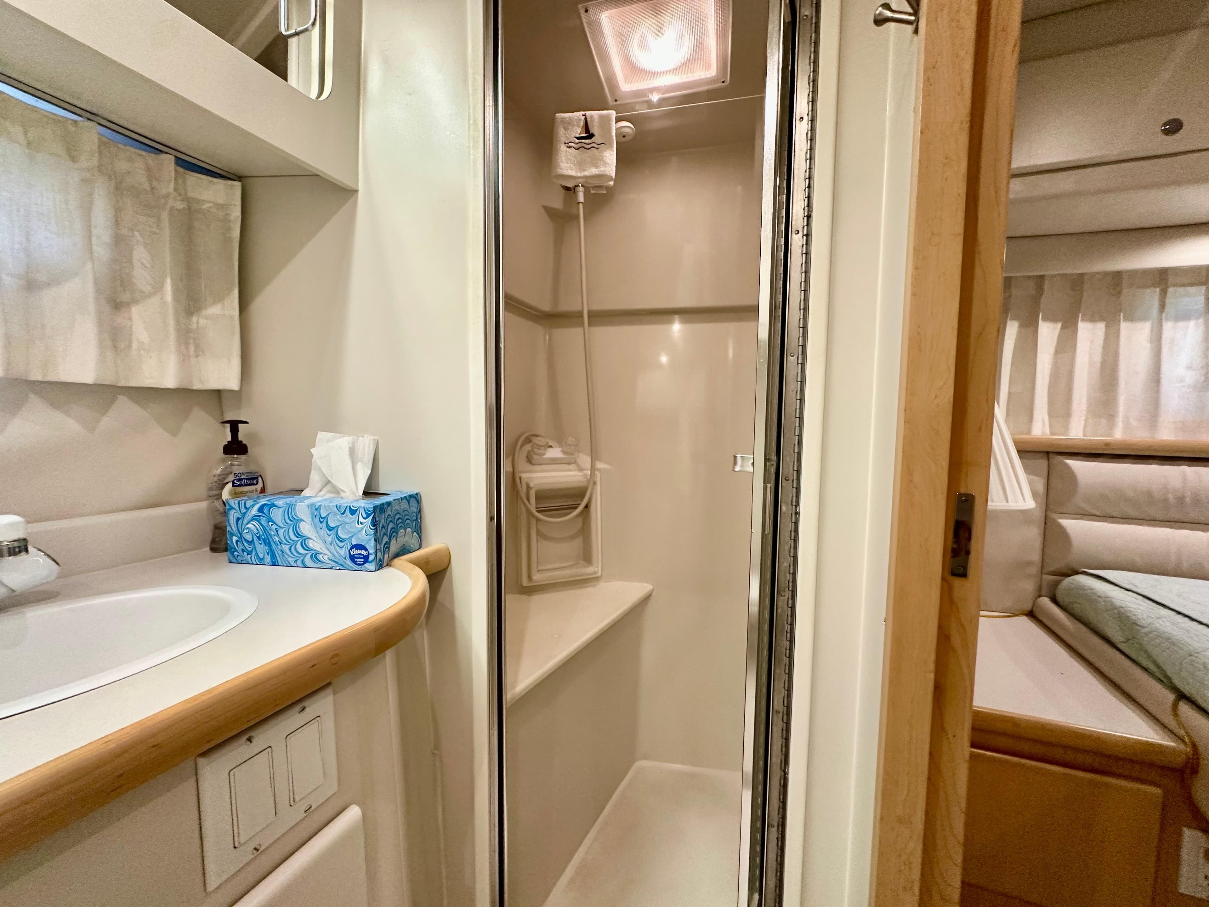 Interior of Carver 440 Yacht with bathroom and sleeping area.