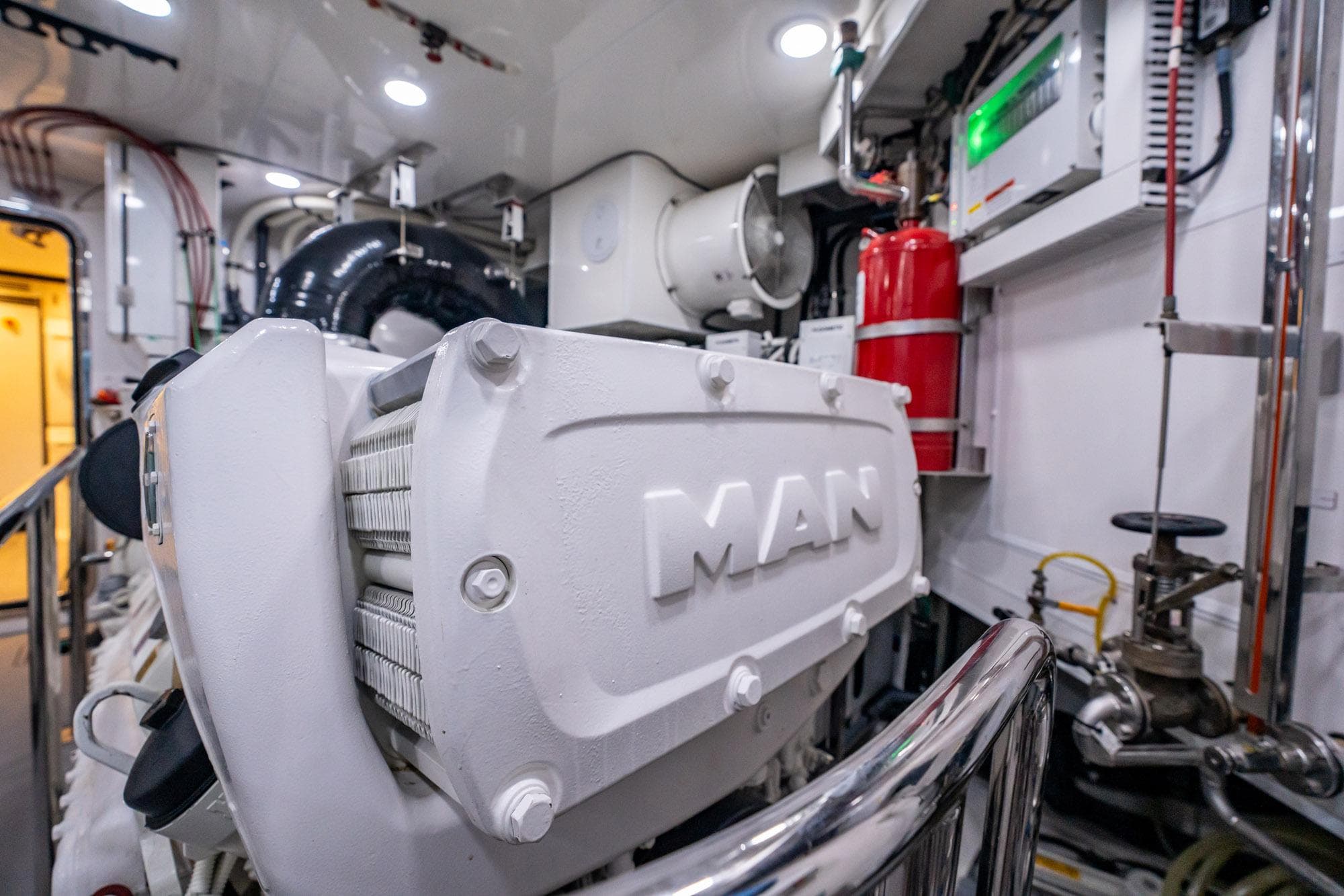 Engine room of 2021 Ocean Alexander 27 Explorer yacht, featuring MAN engine components.
