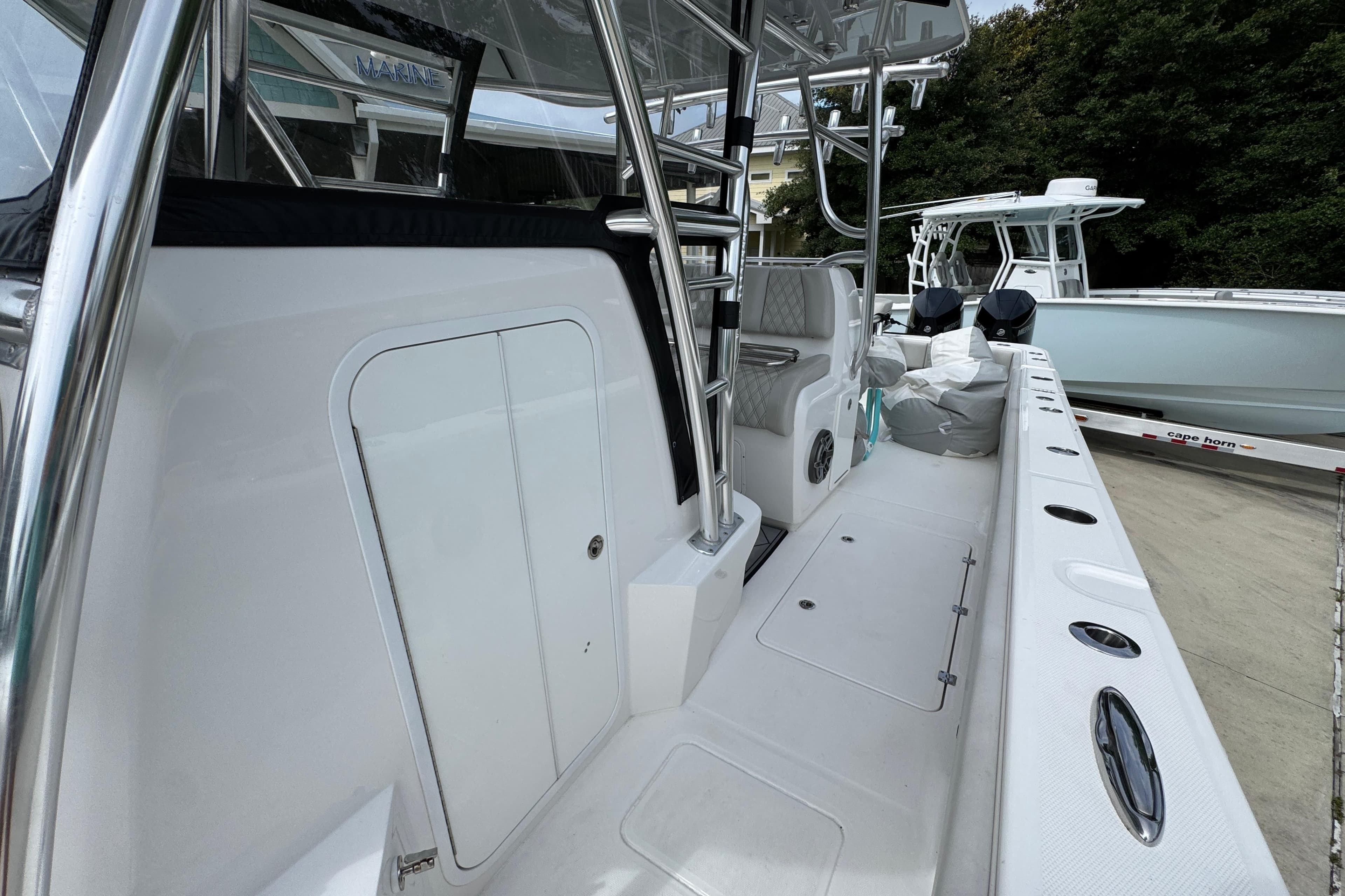 2020 Invincible 35 Catamaran interior with seating and storage compartments.
