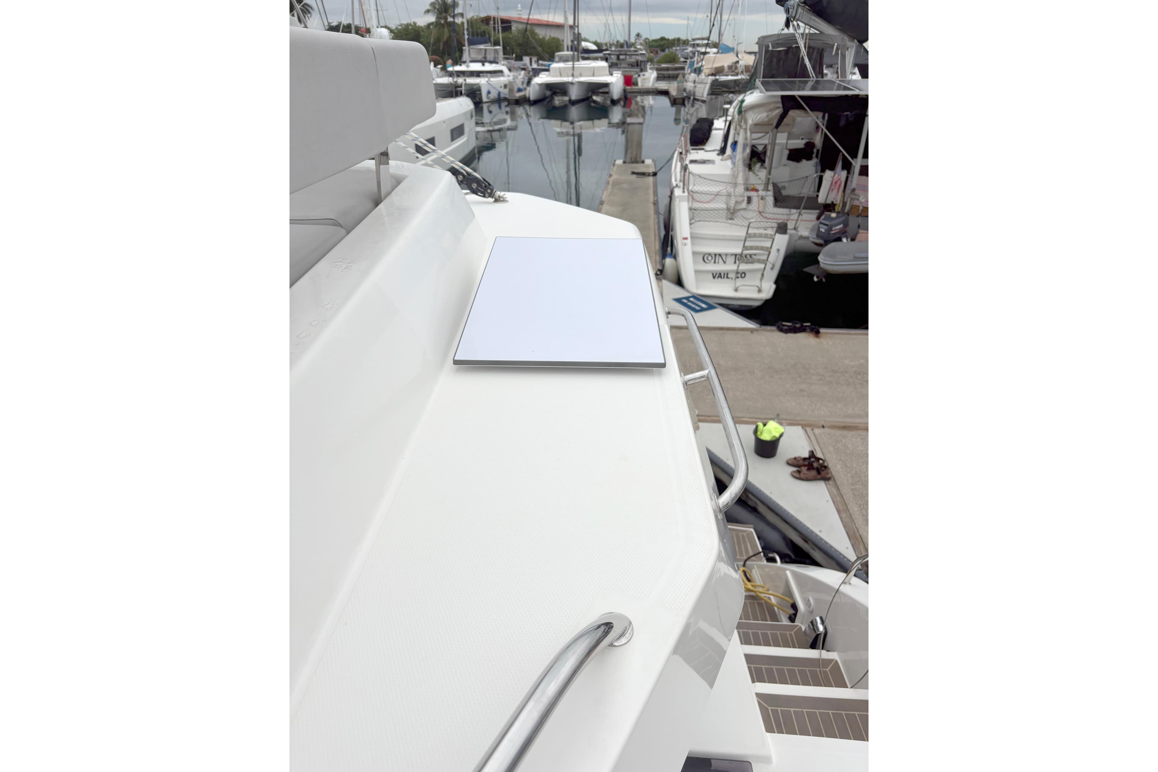 Leopard 42 yacht docked at marina, showcasing sleek deck design, 2025 model.