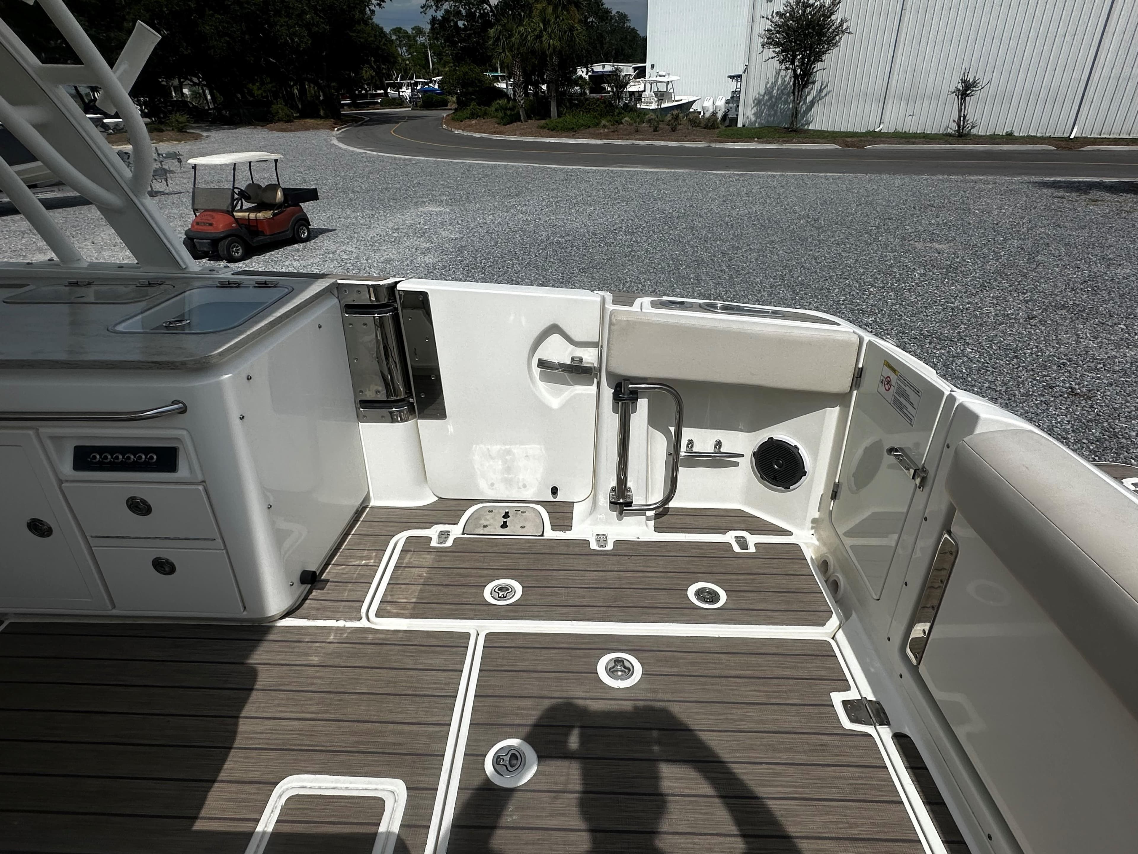 2016 Boston Whaler 320 Vantage boat deck with seating and storage.