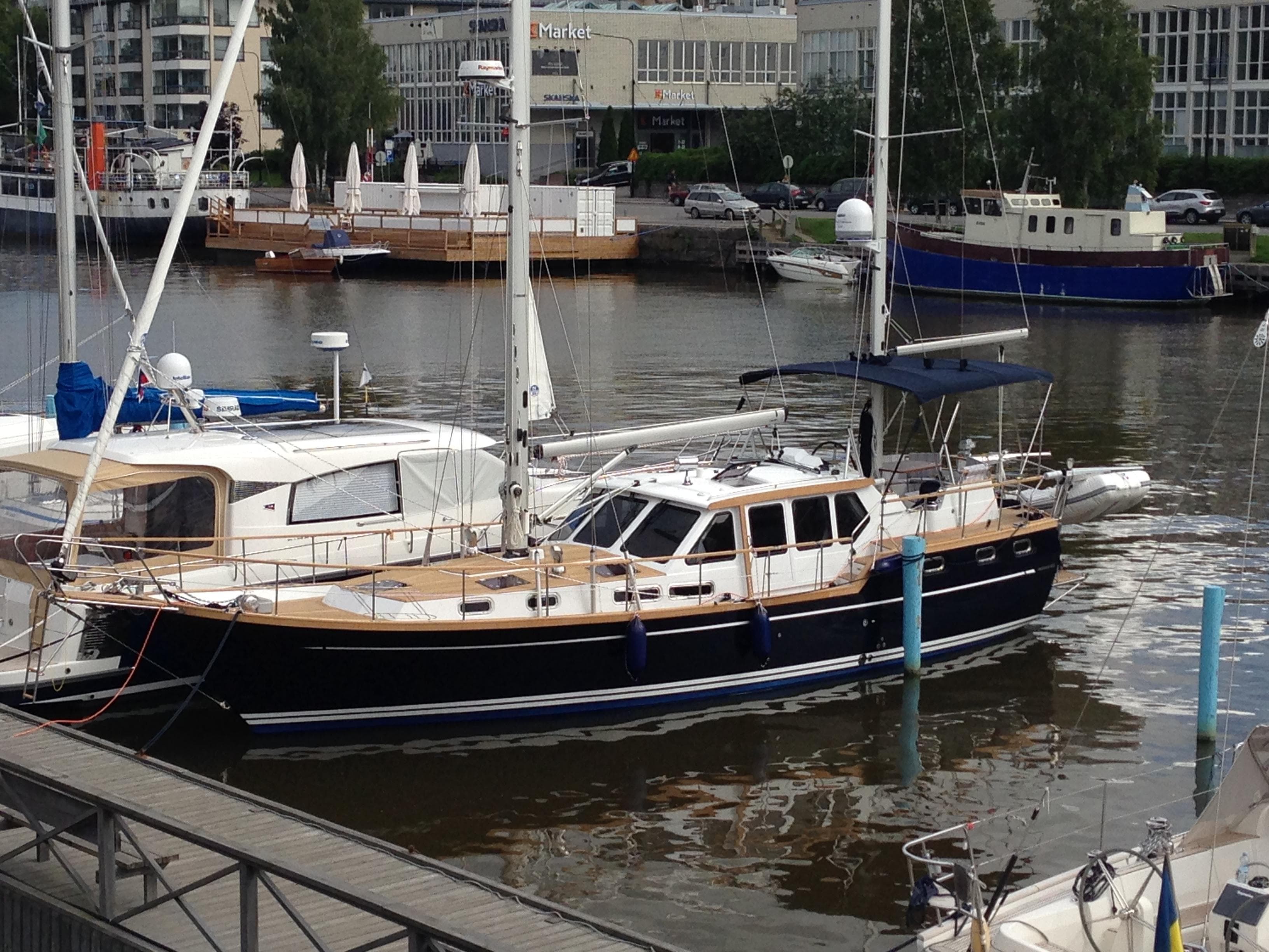 Sailing yacht Nauticat 441, 2017 model, docked in a marina.
