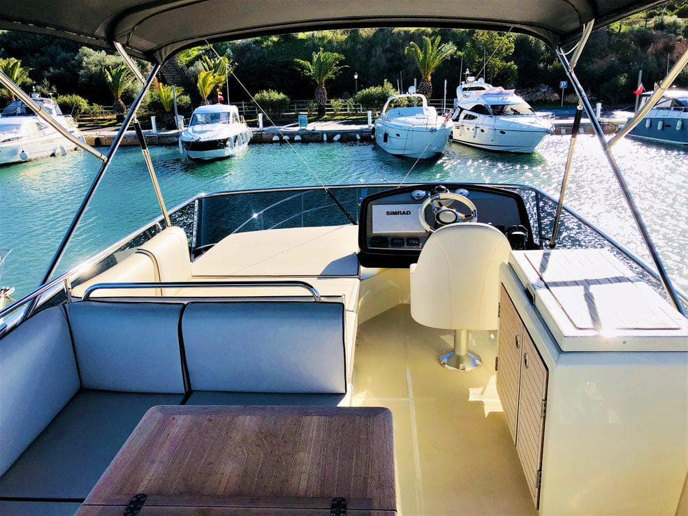 Luxurious 2017 Monte Carlo Yachts MCY 4 interior with marina view.